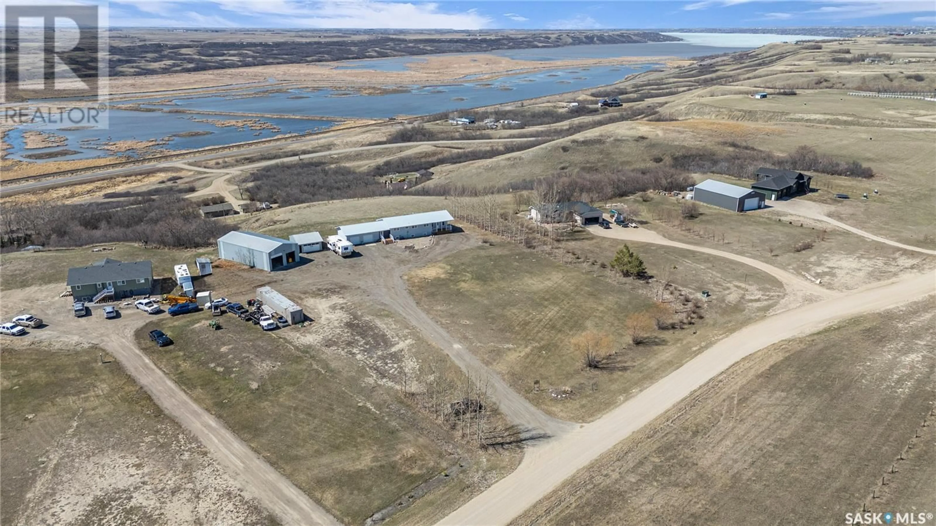 A pic from outside/outdoor area/front of a property/back of a property/a pic from drone, water/lake/river/ocean view for 13 CUMMINS ROAD, Longlaketon Rm No. 219 Saskatchewan S0G0W0