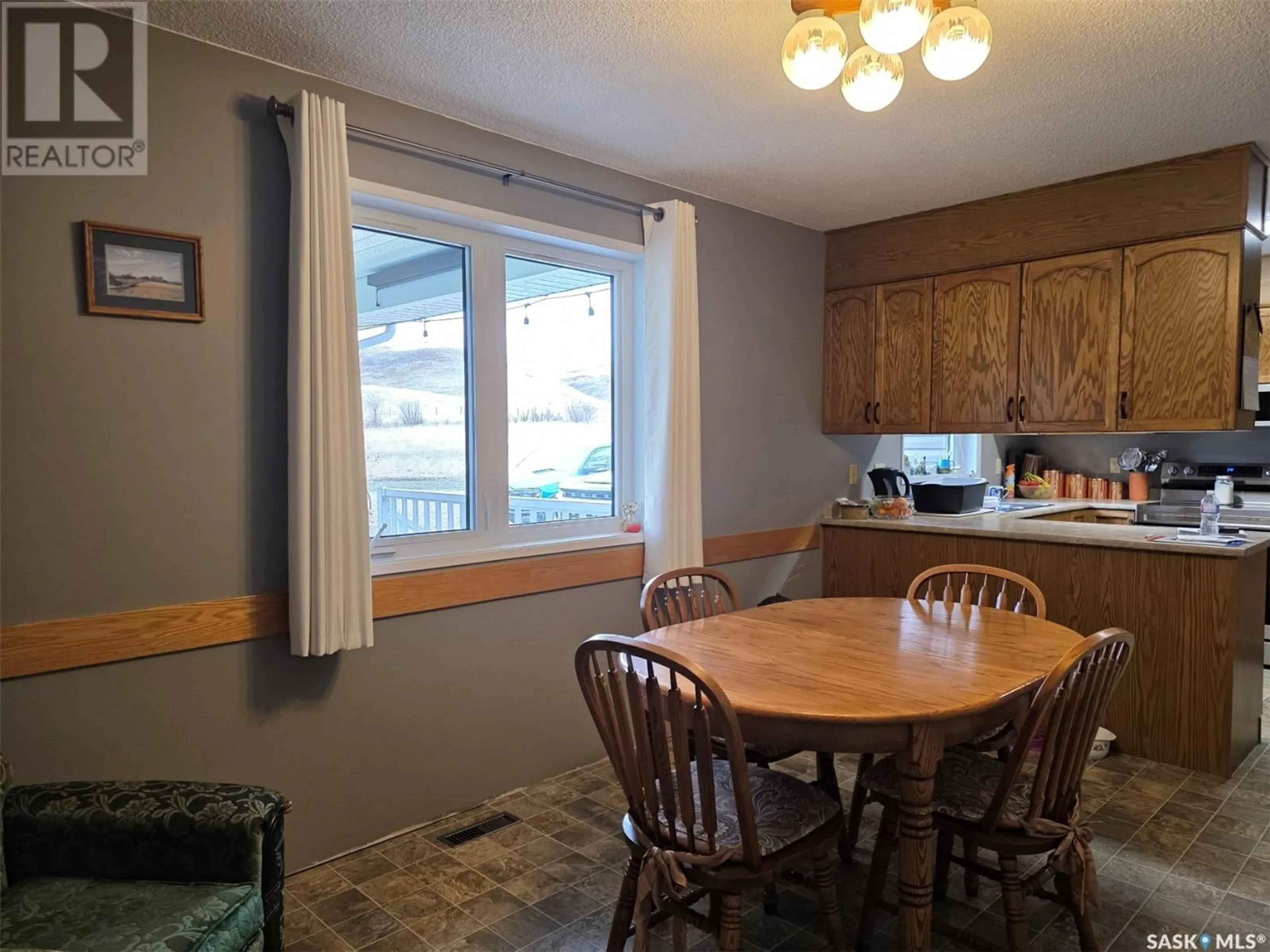 Dining room, wood/laminate floor for Carefree Park - 1 FISHERMAN'S DRIVE, Bone Creek Rm No. 108 Saskatchewan S0N2M0