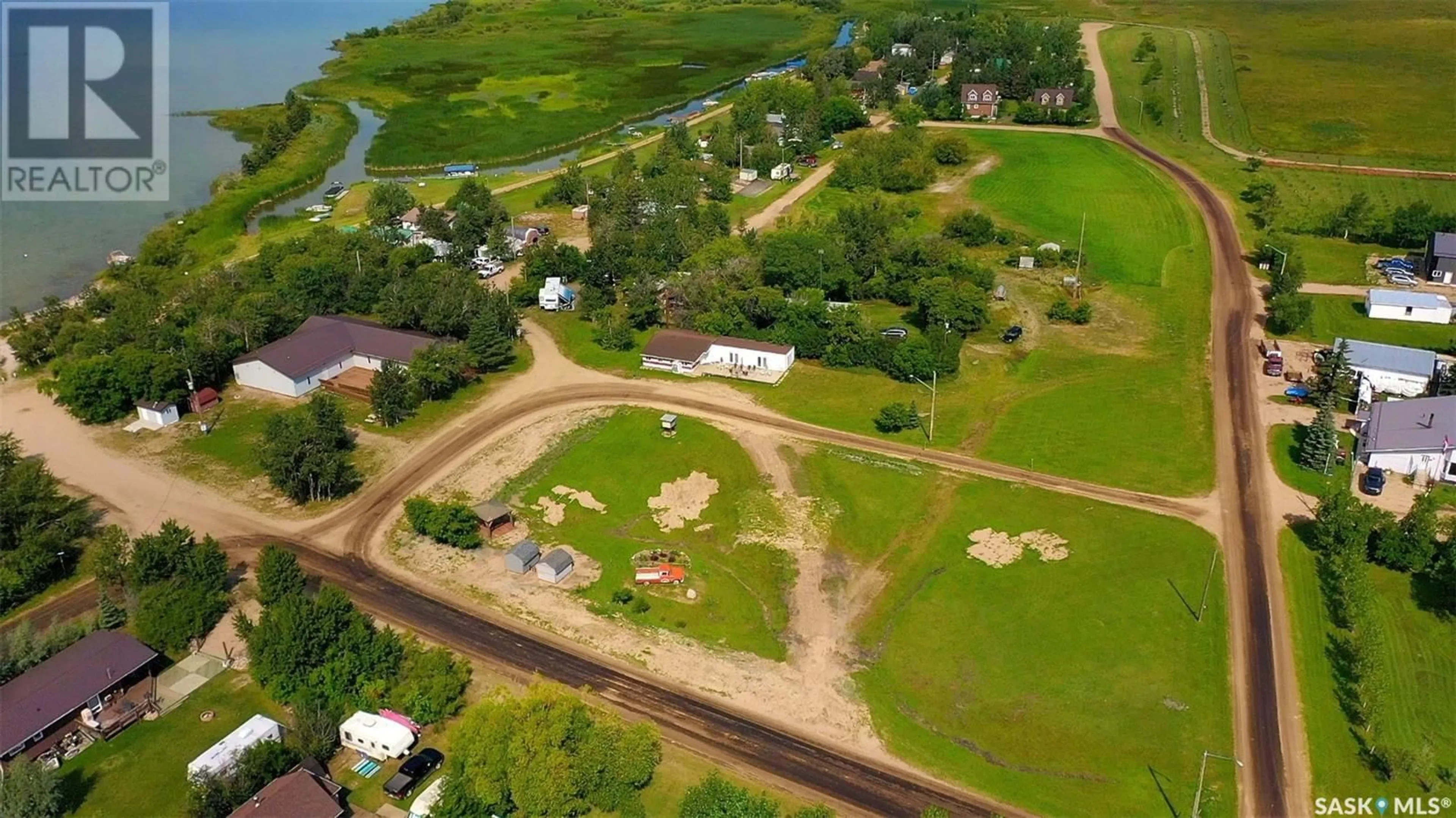 A pic from outside/outdoor area/front of a property/back of a property/a pic from drone, water/lake/river/ocean view for 1126 DEERFOOT TRAIL, Burgis Beach Saskatchewan S0A0L0