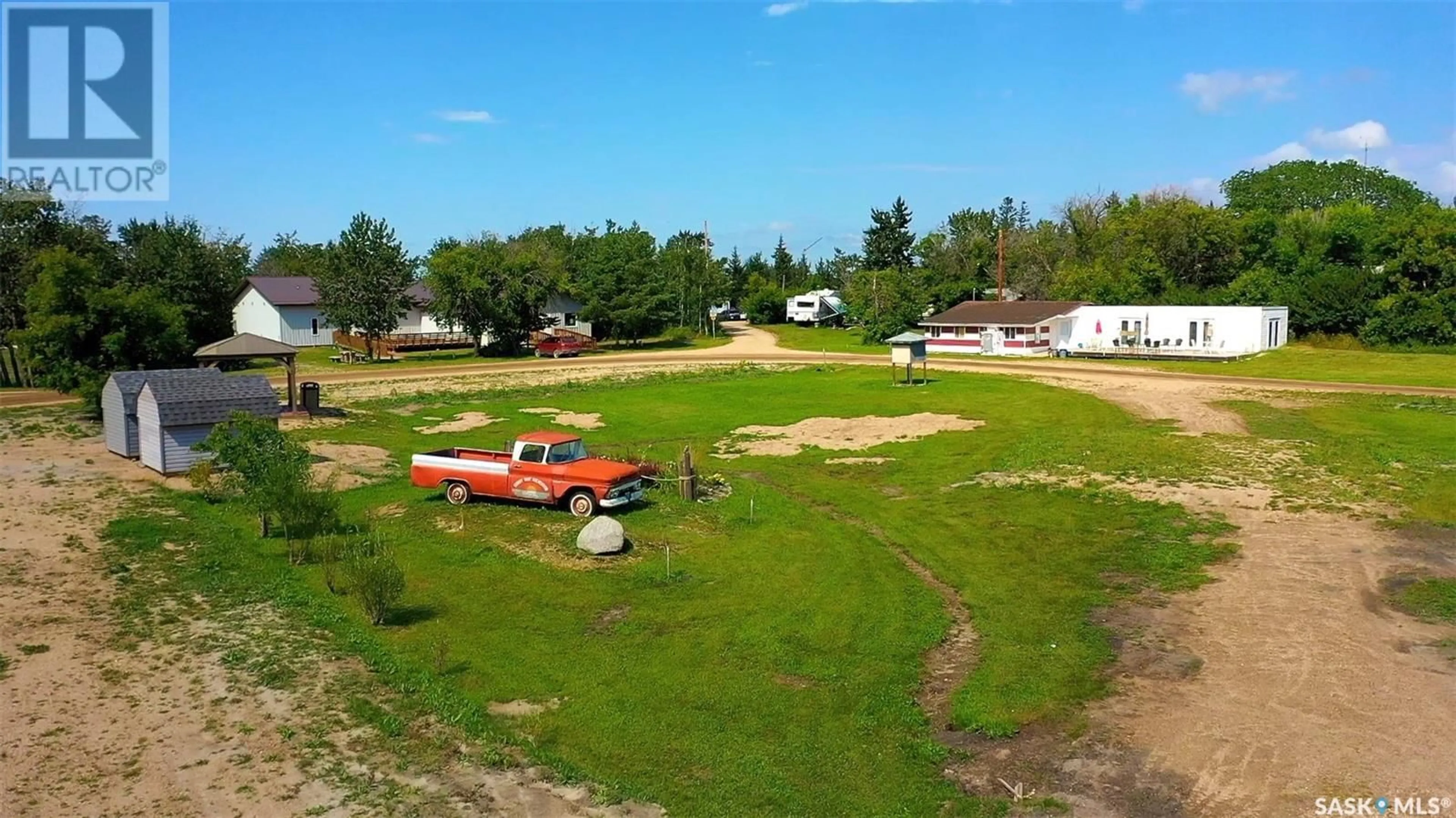 A pic from outside/outdoor area/front of a property/back of a property/a pic from drone, street for 1126 DEERFOOT TRAIL, Burgis Beach Saskatchewan S0A0L0