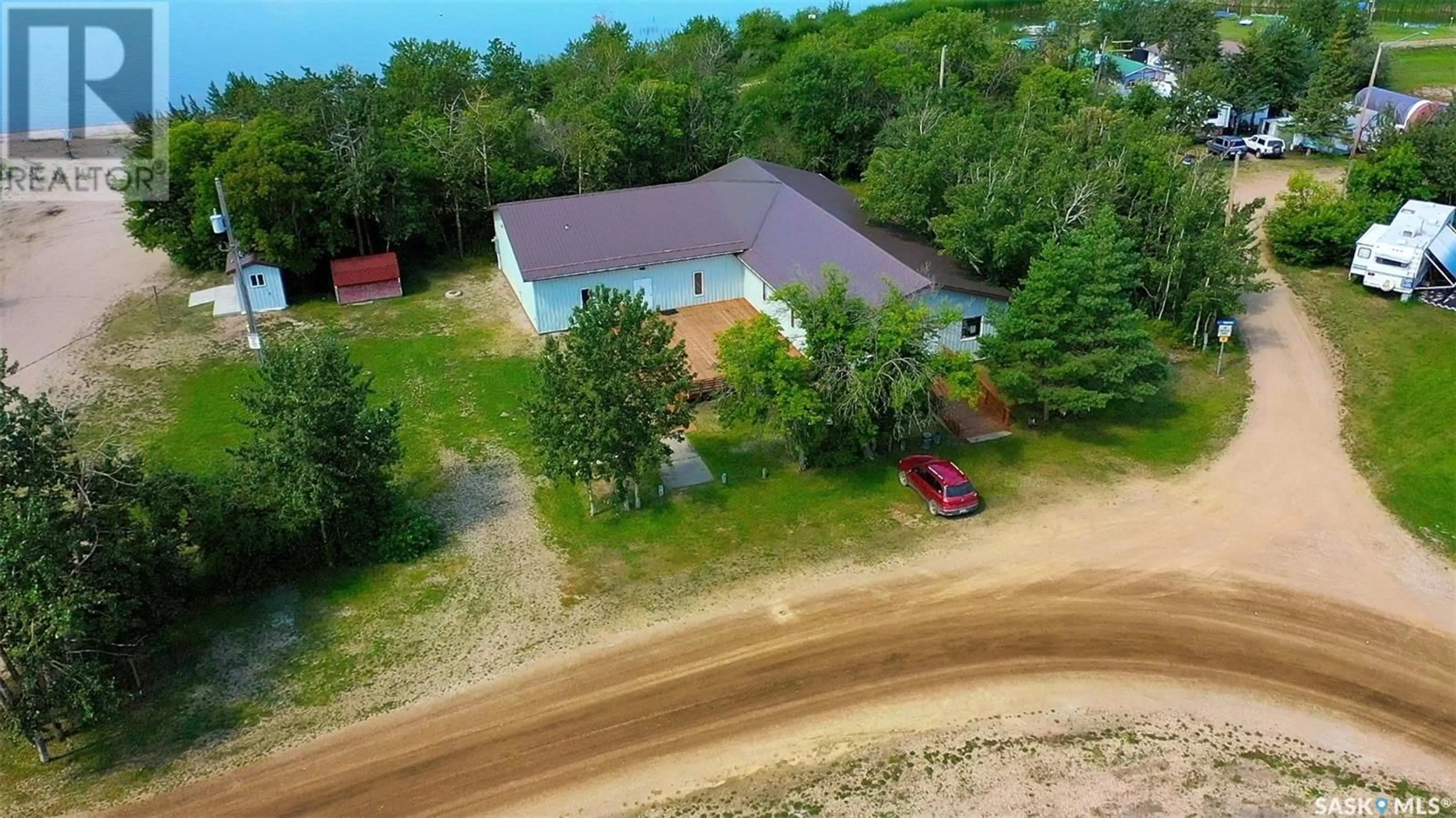 A pic from outside/outdoor area/front of a property/back of a property/a pic from drone, building for 1126 DEERFOOT TRAIL, Burgis Beach Saskatchewan S0A0L0