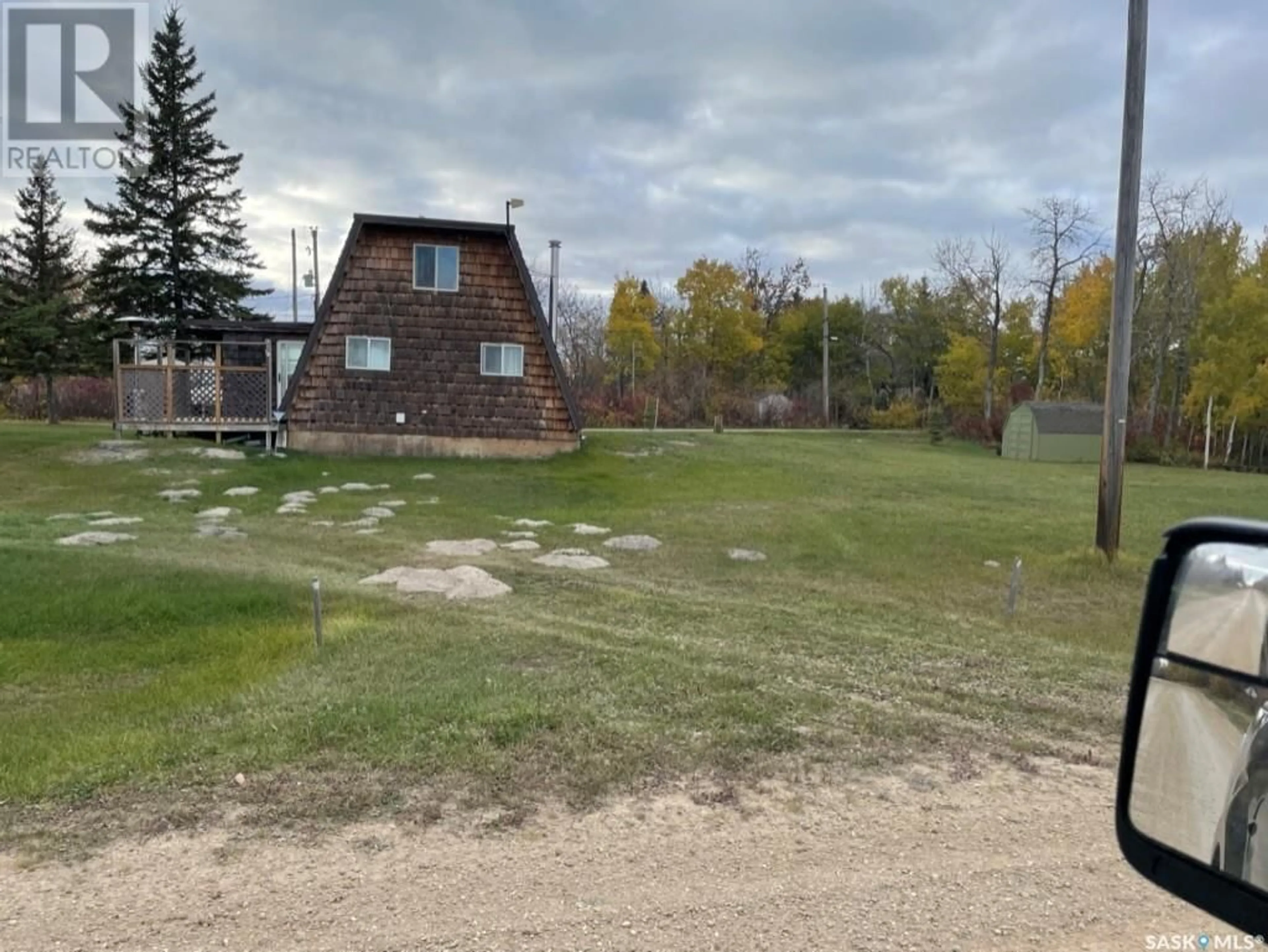 A pic from outside/outdoor area/front of a property/back of a property/a pic from drone, unknown for 1127 DEERFOOT TRAIL, Burgis Beach Saskatchewan S0A0L0