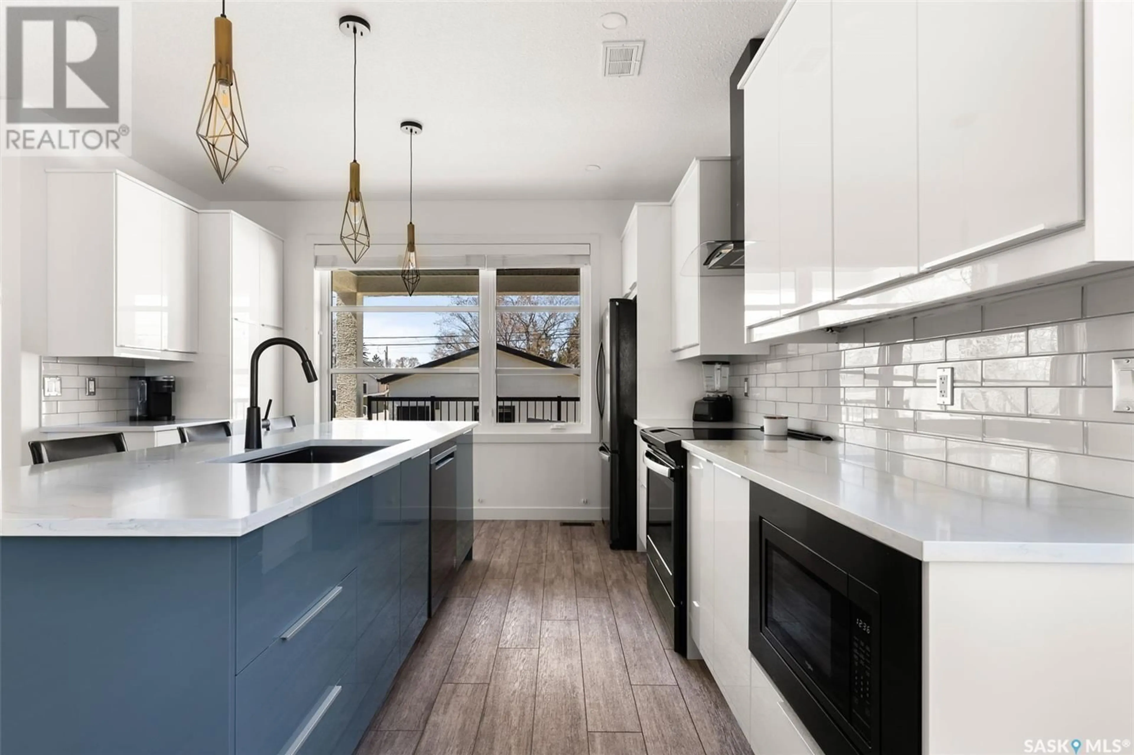Open concept kitchen, ceramic/tile floor for 2102 MCDONALD STREET, Regina Saskatchewan S4N2Y7
