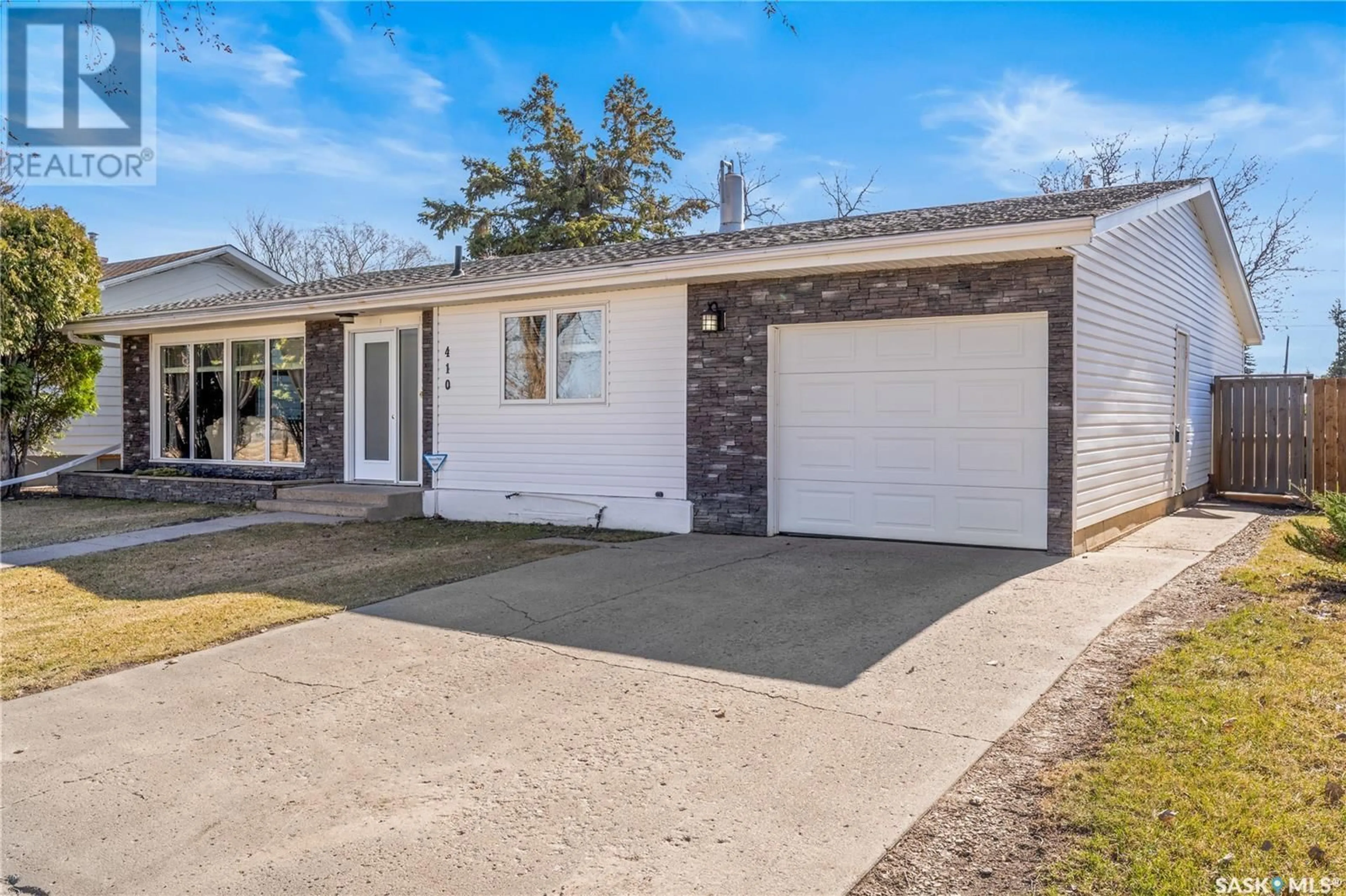 Home with brick exterior material, street for 410 SCOTIA STREET, Melfort Saskatchewan S0E1A0