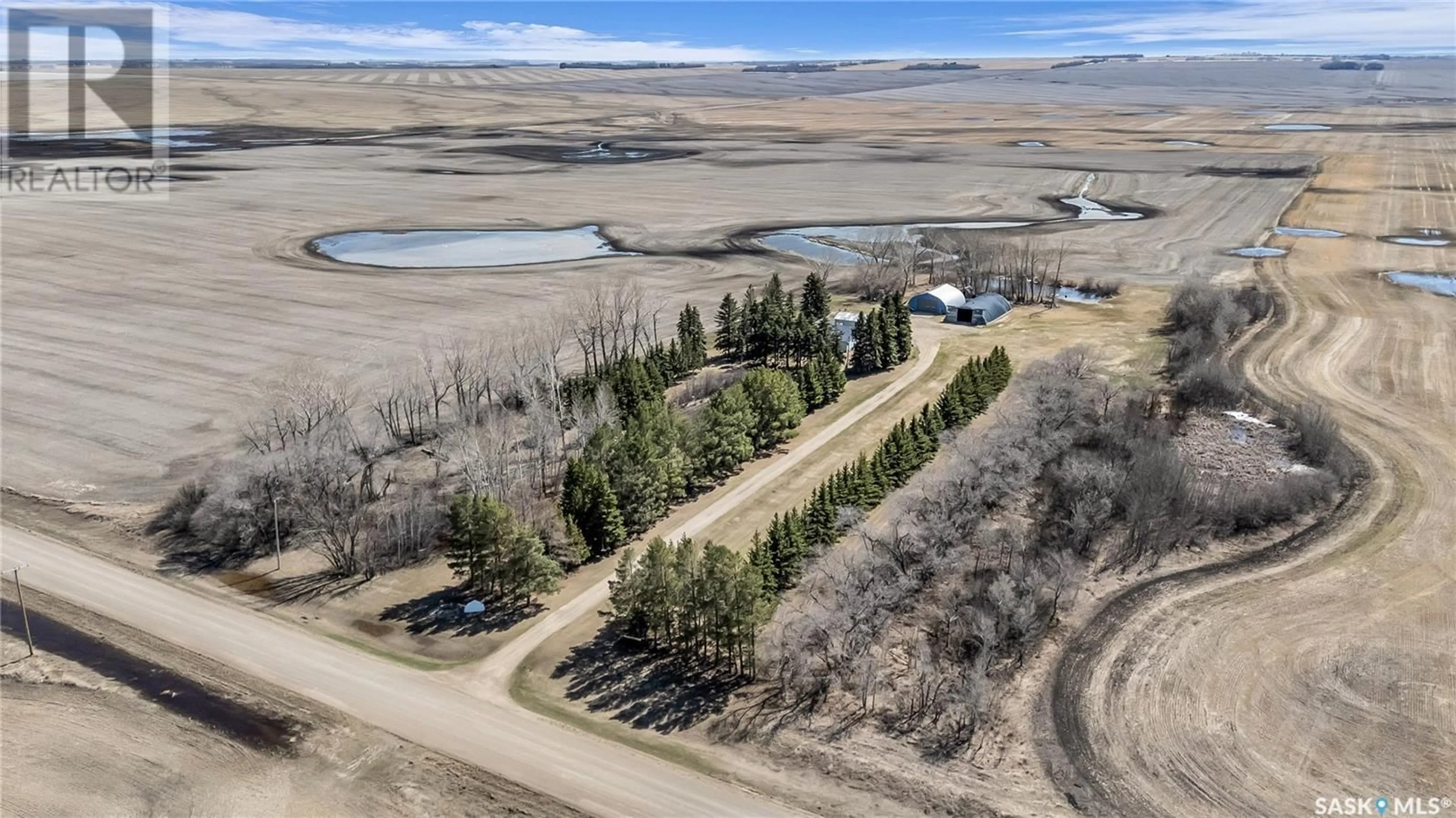 A pic from outside/outdoor area/front of a property/back of a property/a pic from drone, water/lake/river/ocean view for TESSIER ACREAGE, St. Louis RM No. 431 Saskatchewan S6V5B7