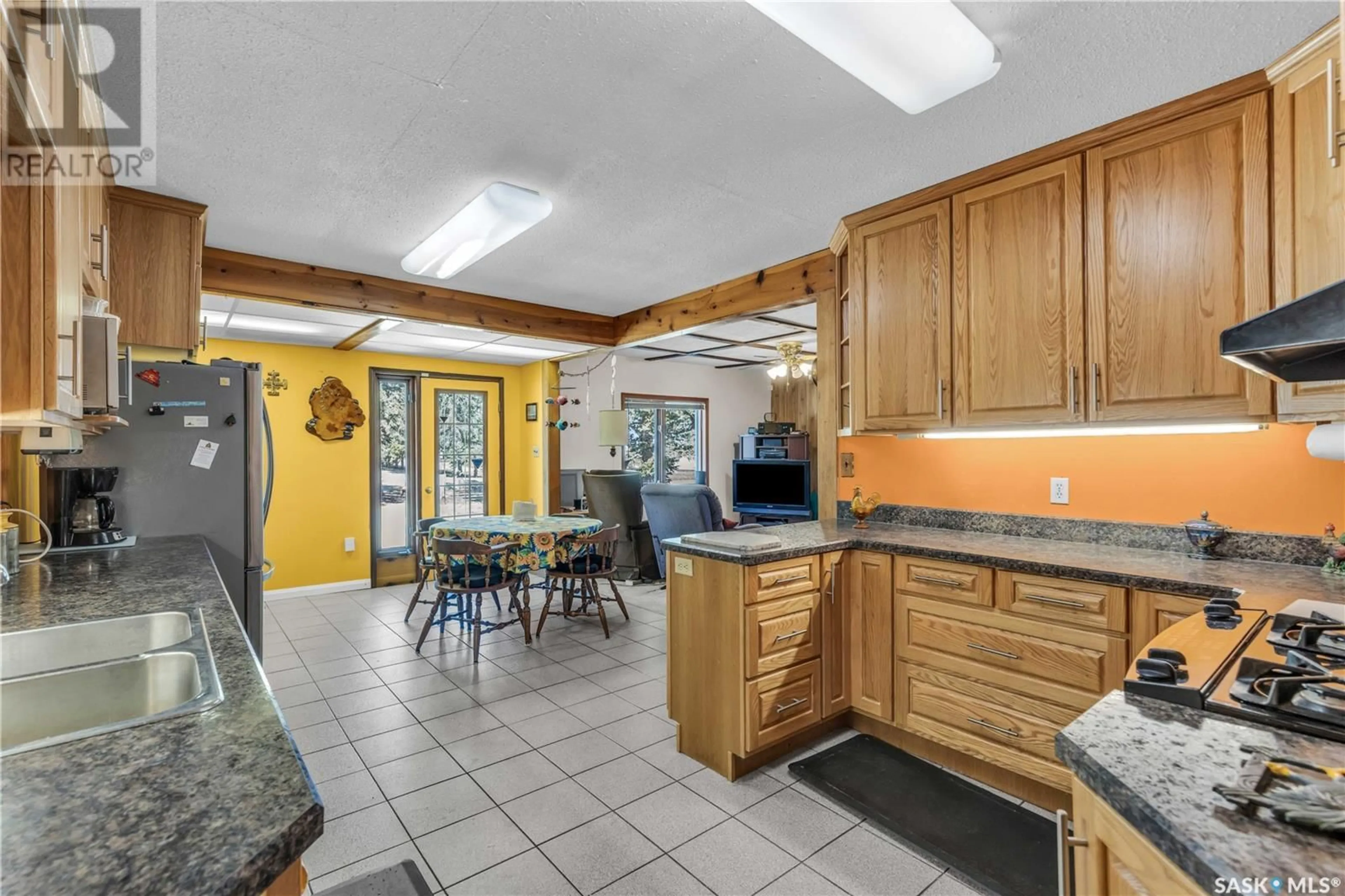 Open concept kitchen, ceramic/tile floor for TESSIER ACREAGE, St. Louis RM No. 431 Saskatchewan S6V5B7