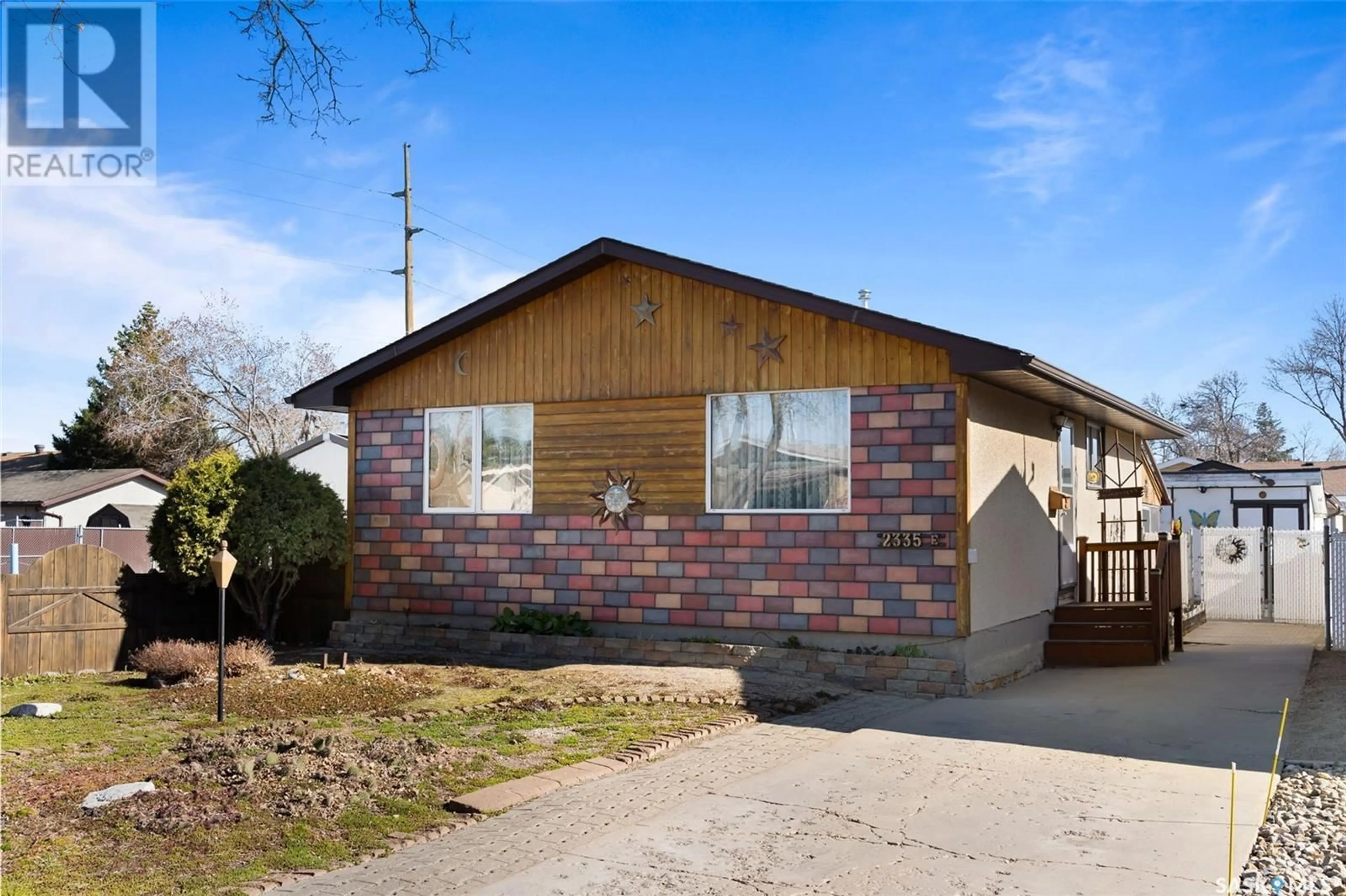 Home with brick exterior material, street for 2335 DEWDNEY AVENUE, Regina Saskatchewan S4N4C4