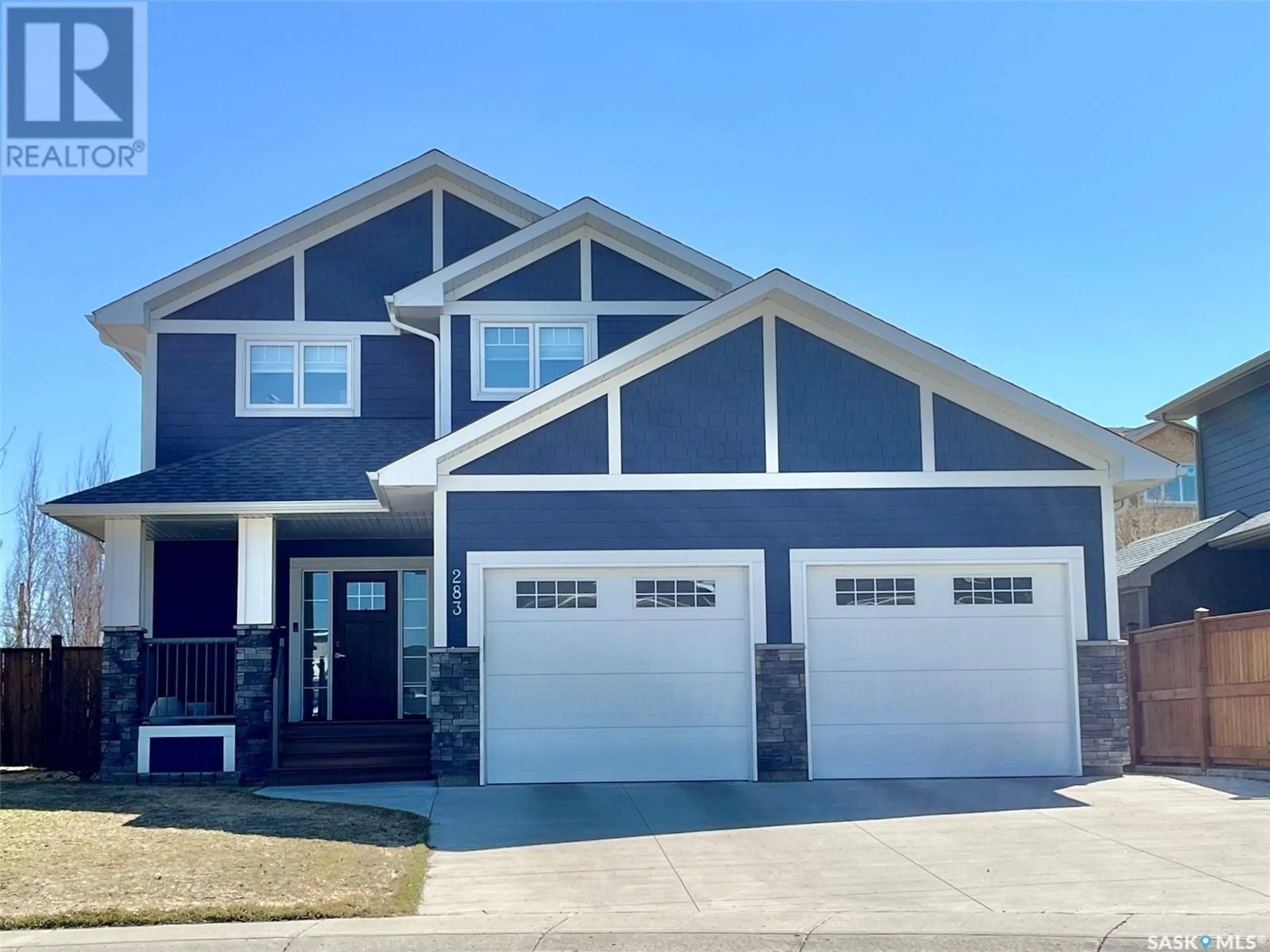 Home with vinyl exterior material, street for 283 EATON CRESCENT, Saskatoon Saskatchewan S7V0H4