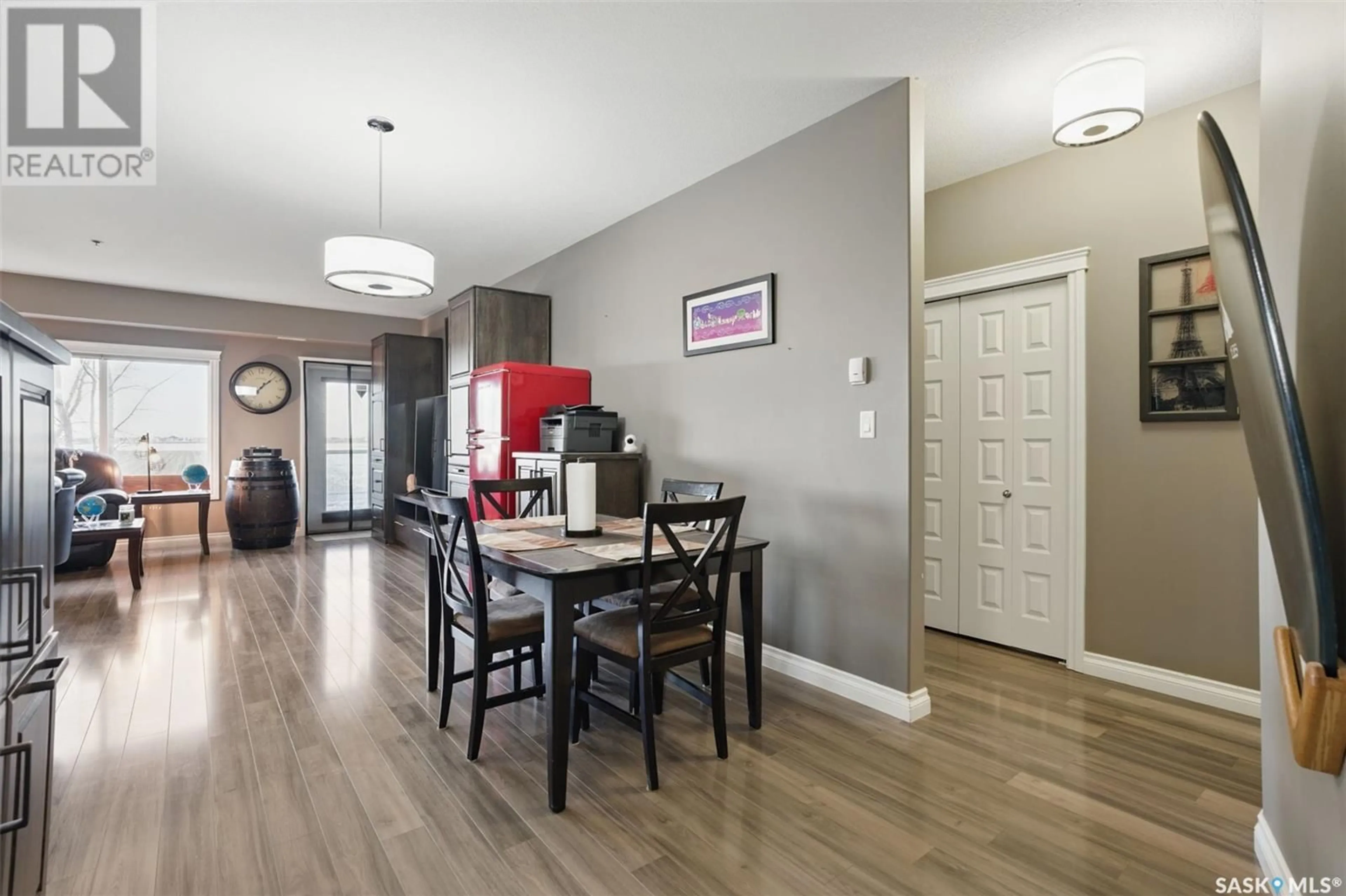Dining room, wood/laminate floor for 419 - 113 NELSON ROAD, Saskatoon Saskatchewan S7S1P2
