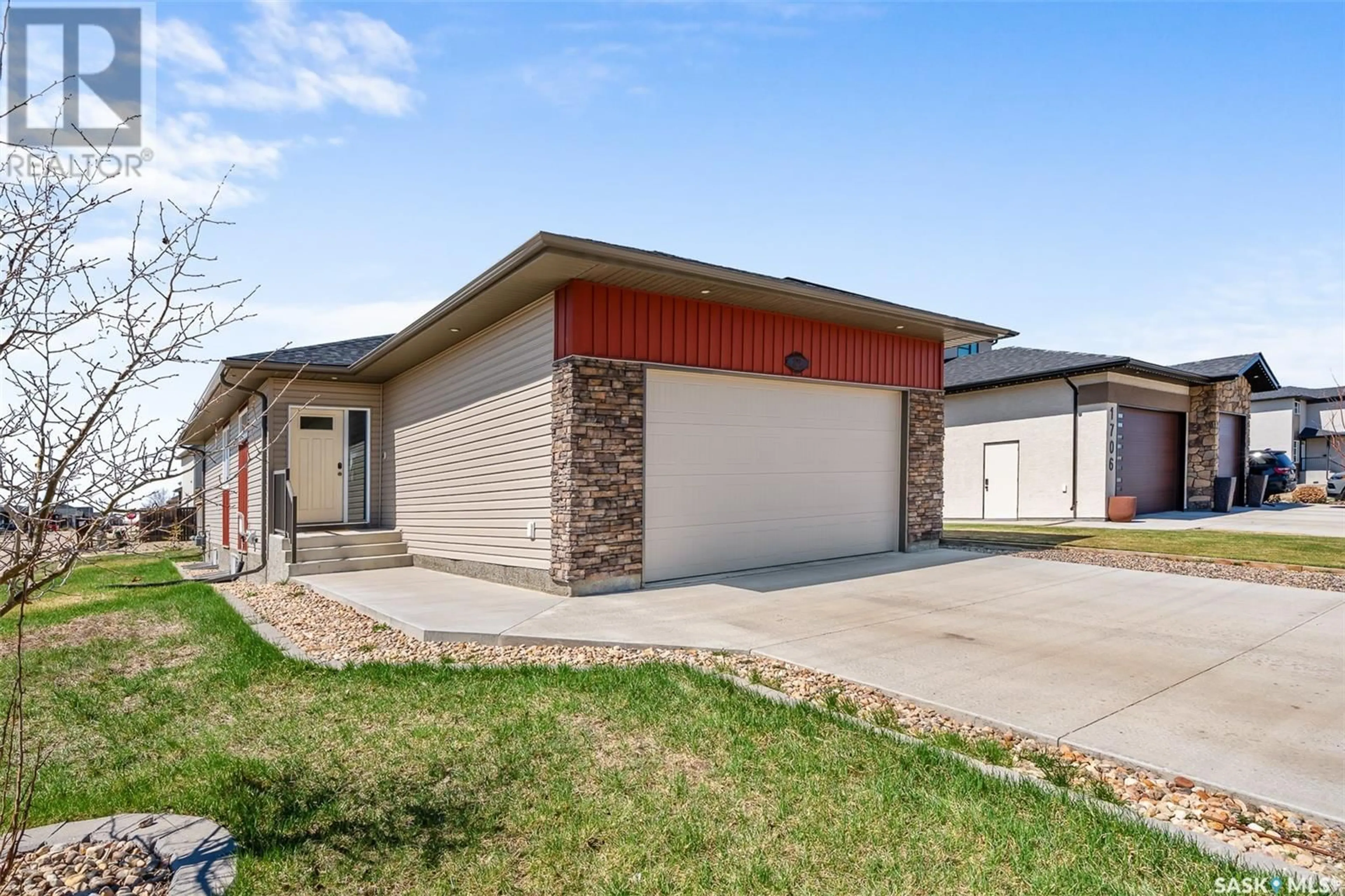 Home with brick exterior material, street for 1702 HAYES LANE, Moose Jaw Saskatchewan S6J0B6