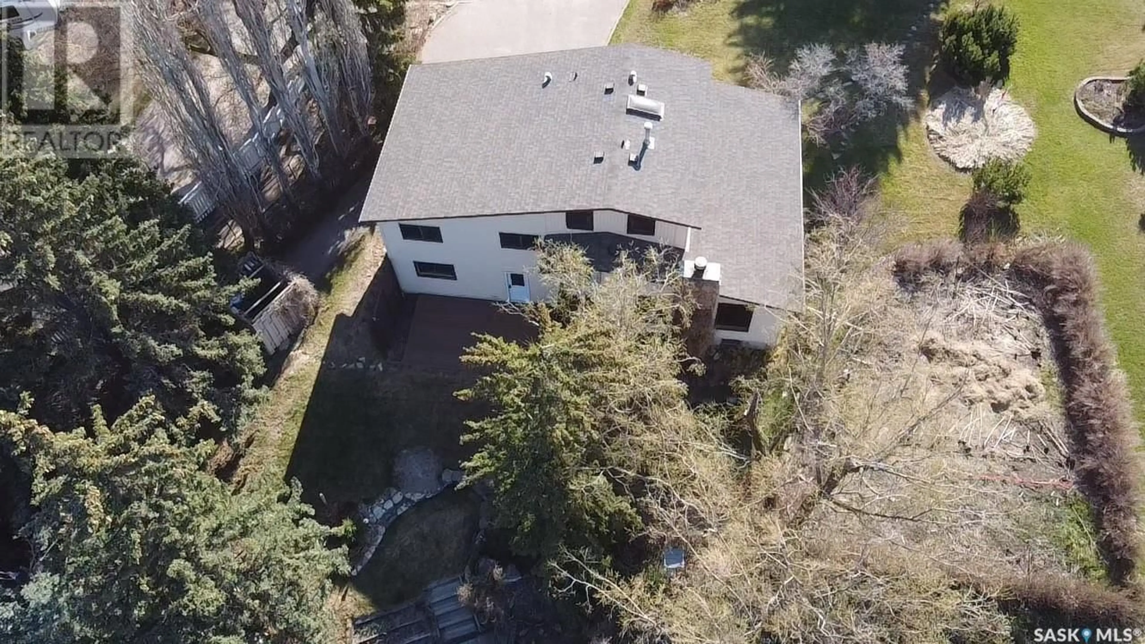 A pic from outside/outdoor area/front of a property/back of a property/a pic from drone, building for 13 CARTER CRESCENT, Outlook Saskatchewan S0L2N0