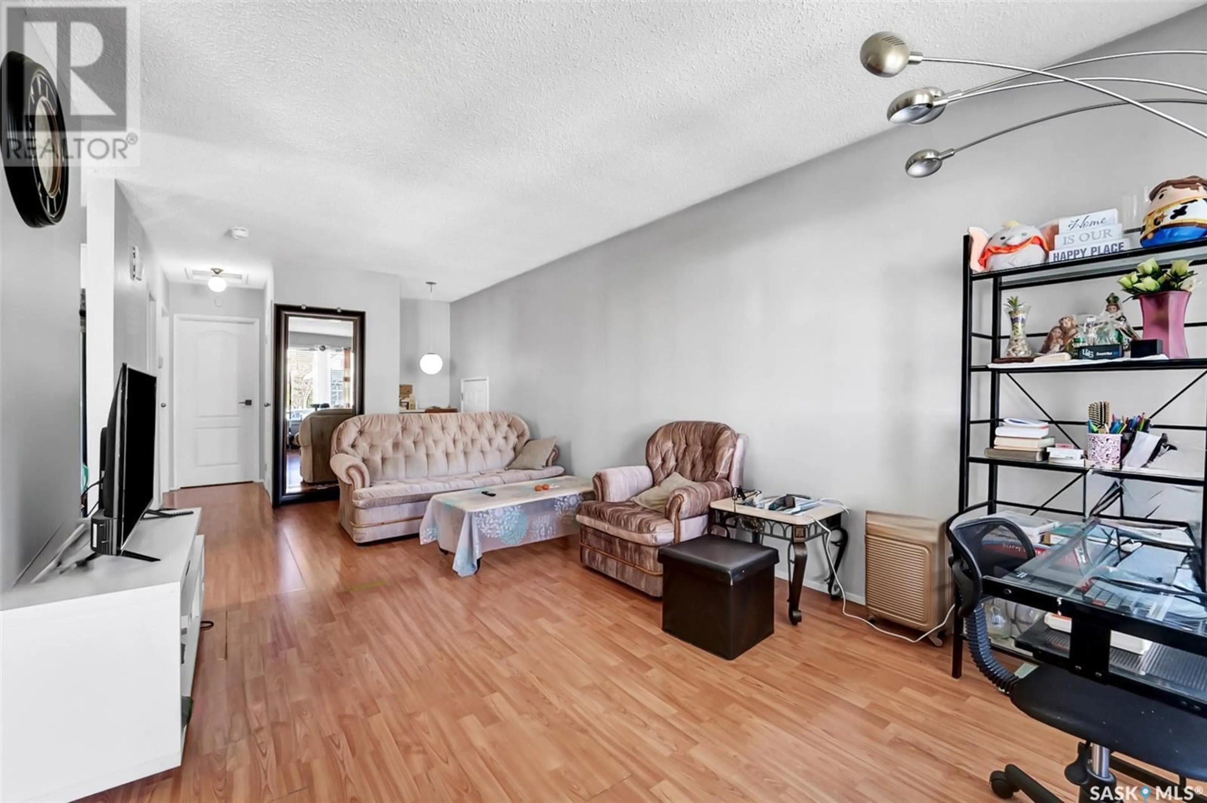 Living room with furniture, unknown for 132 M AVENUE, Saskatoon Saskatchewan S7M2K2