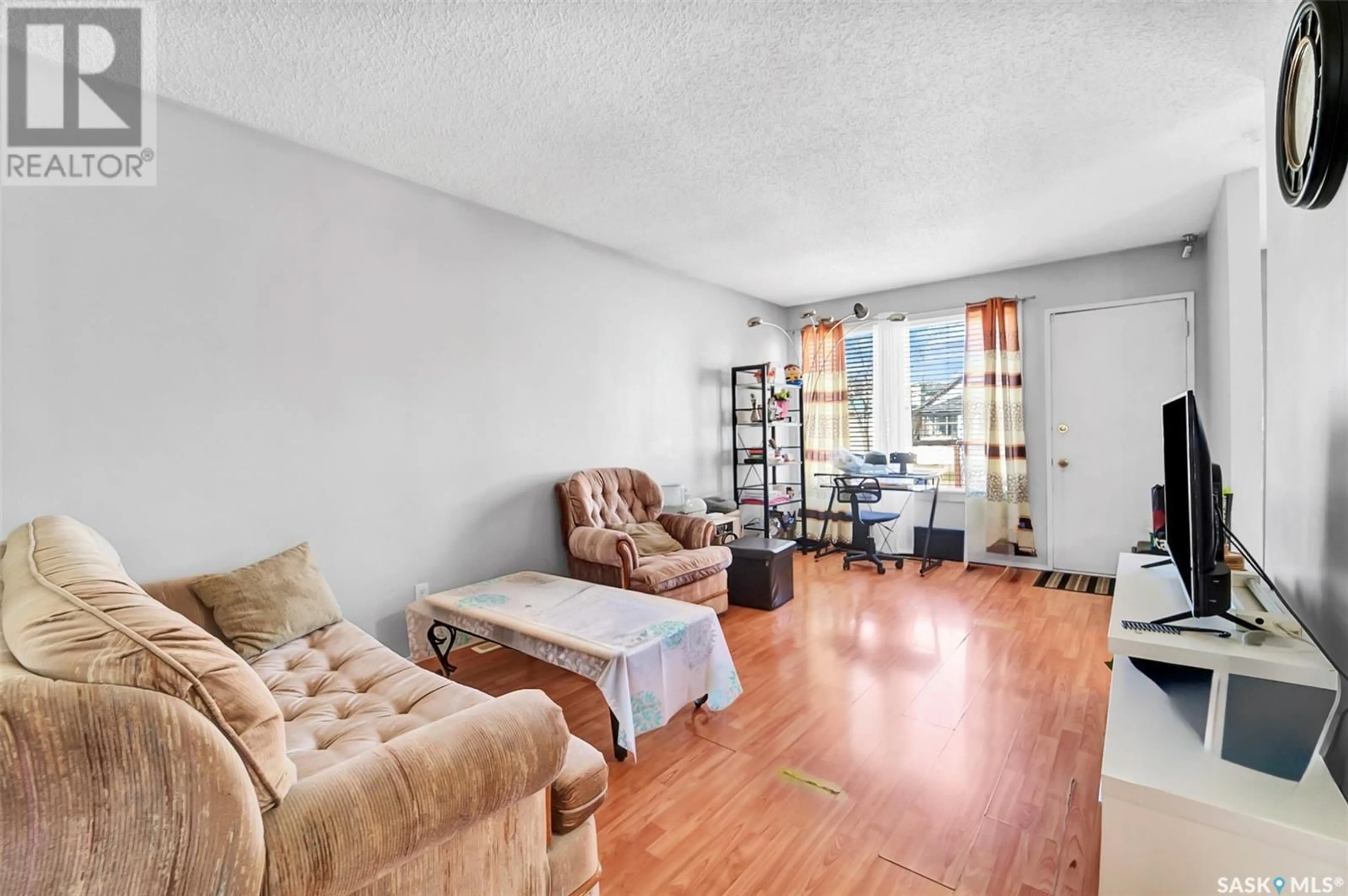 Living room with furniture, unknown for 132 M AVENUE, Saskatoon Saskatchewan S7M2K2