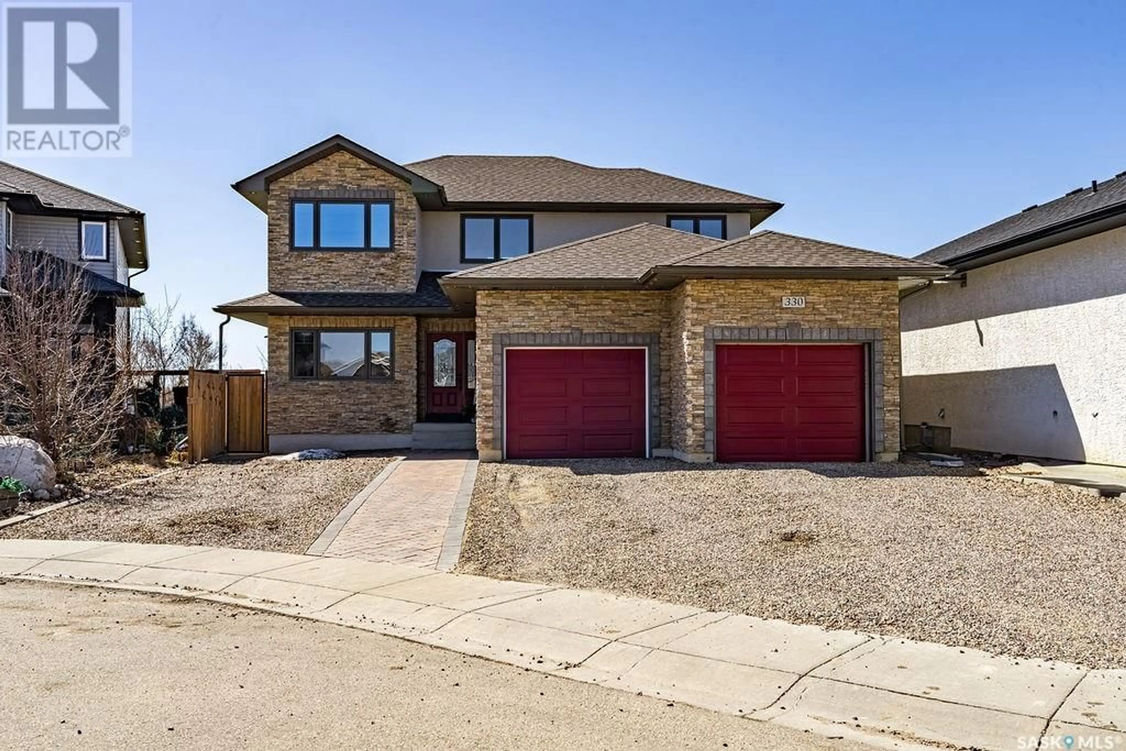 Home with brick exterior material, street for 330 GREENFIELD TERRACE, Saskatoon Saskatchewan S7R0B7