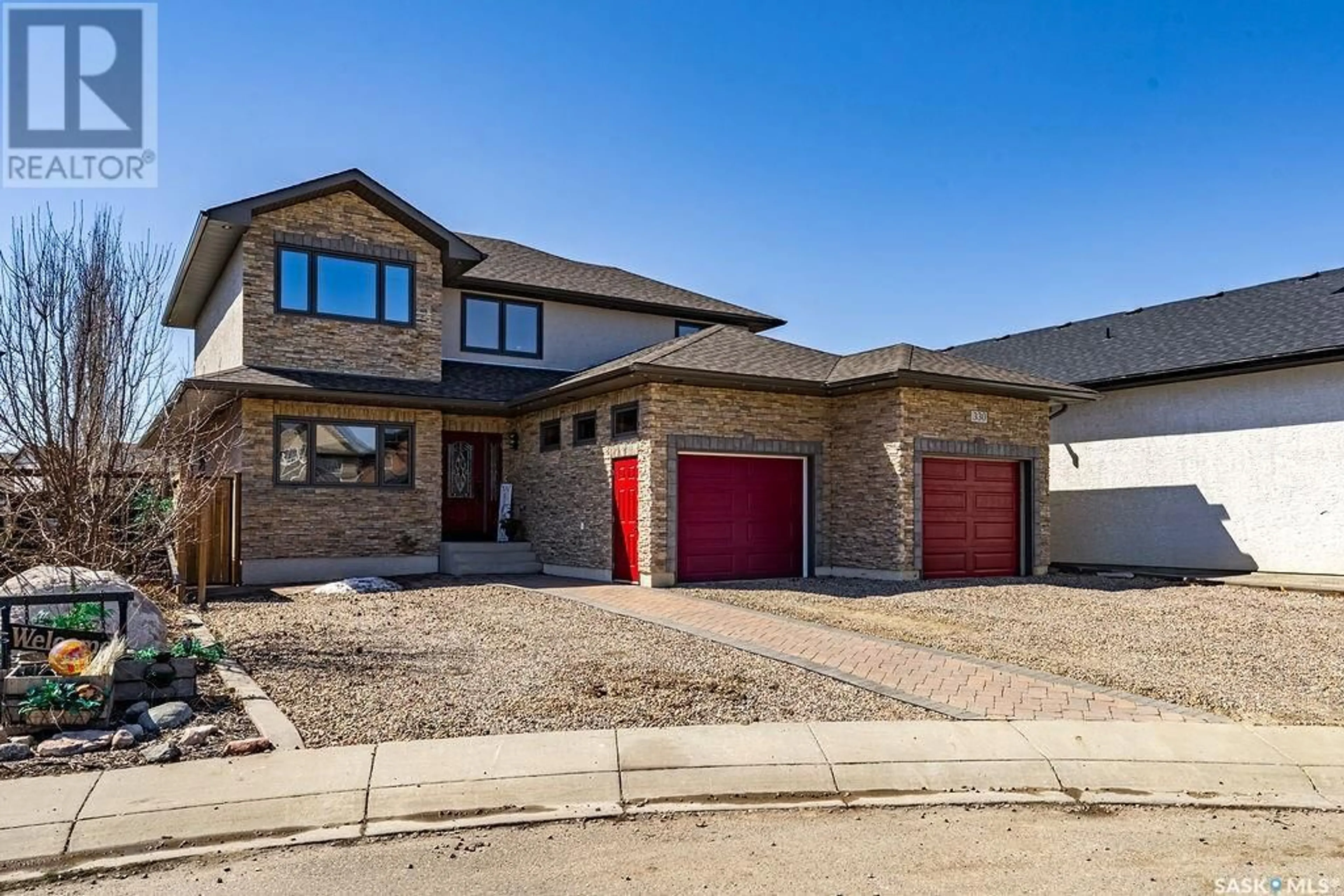 Home with brick exterior material, street for 330 GREENFIELD TERRACE, Saskatoon Saskatchewan S7R0B7