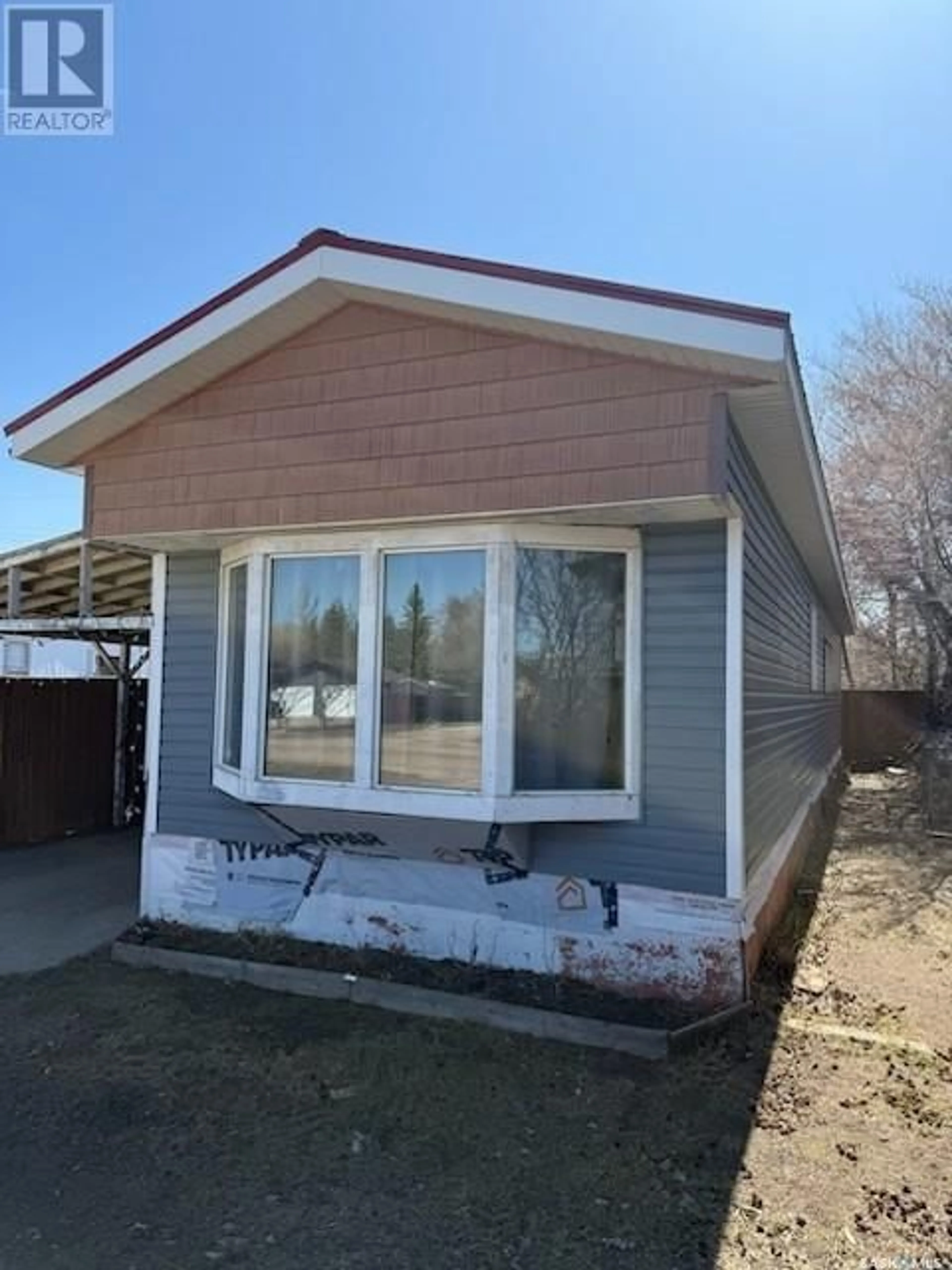 Home with vinyl exterior material, street for 351 30TH STREET, Battleford Saskatchewan S0M0E0