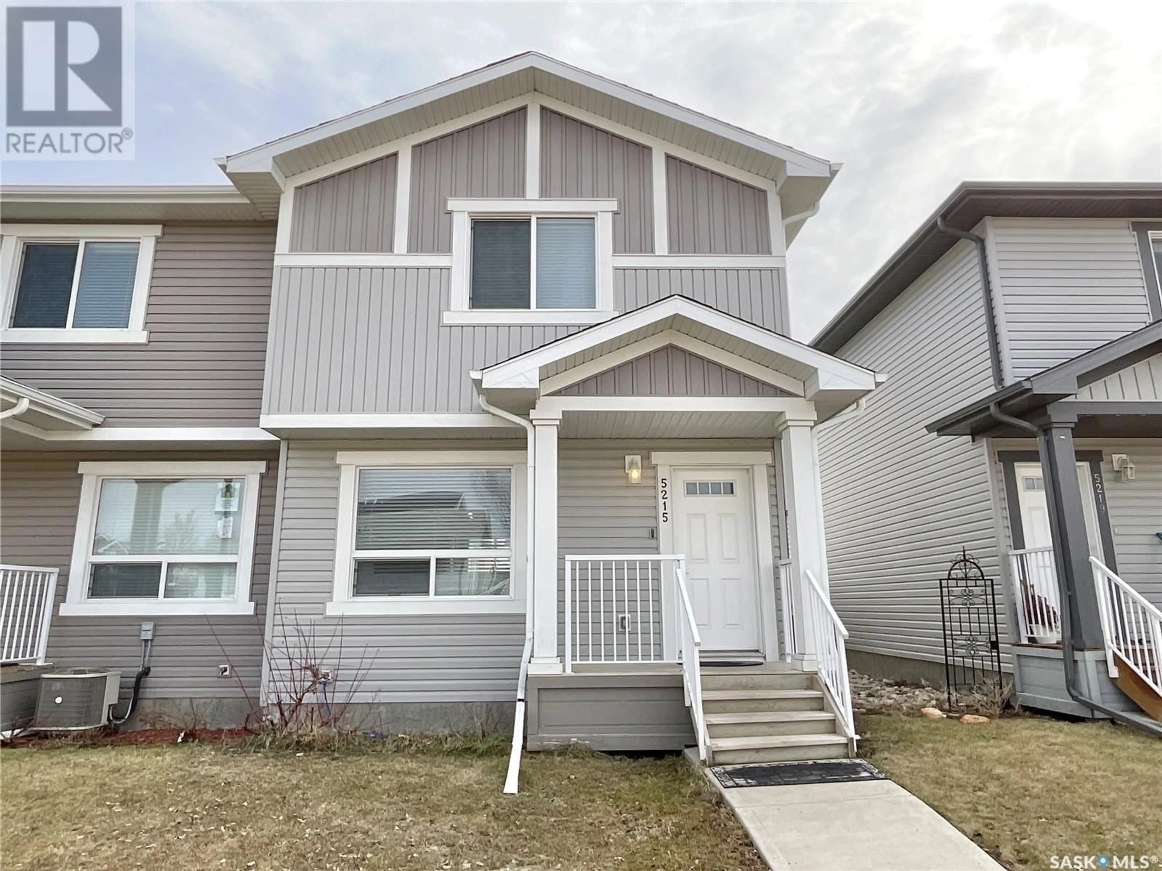 Home with vinyl exterior material, street for 5215 BEACON WAY, Regina Saskatchewan S4W0H8