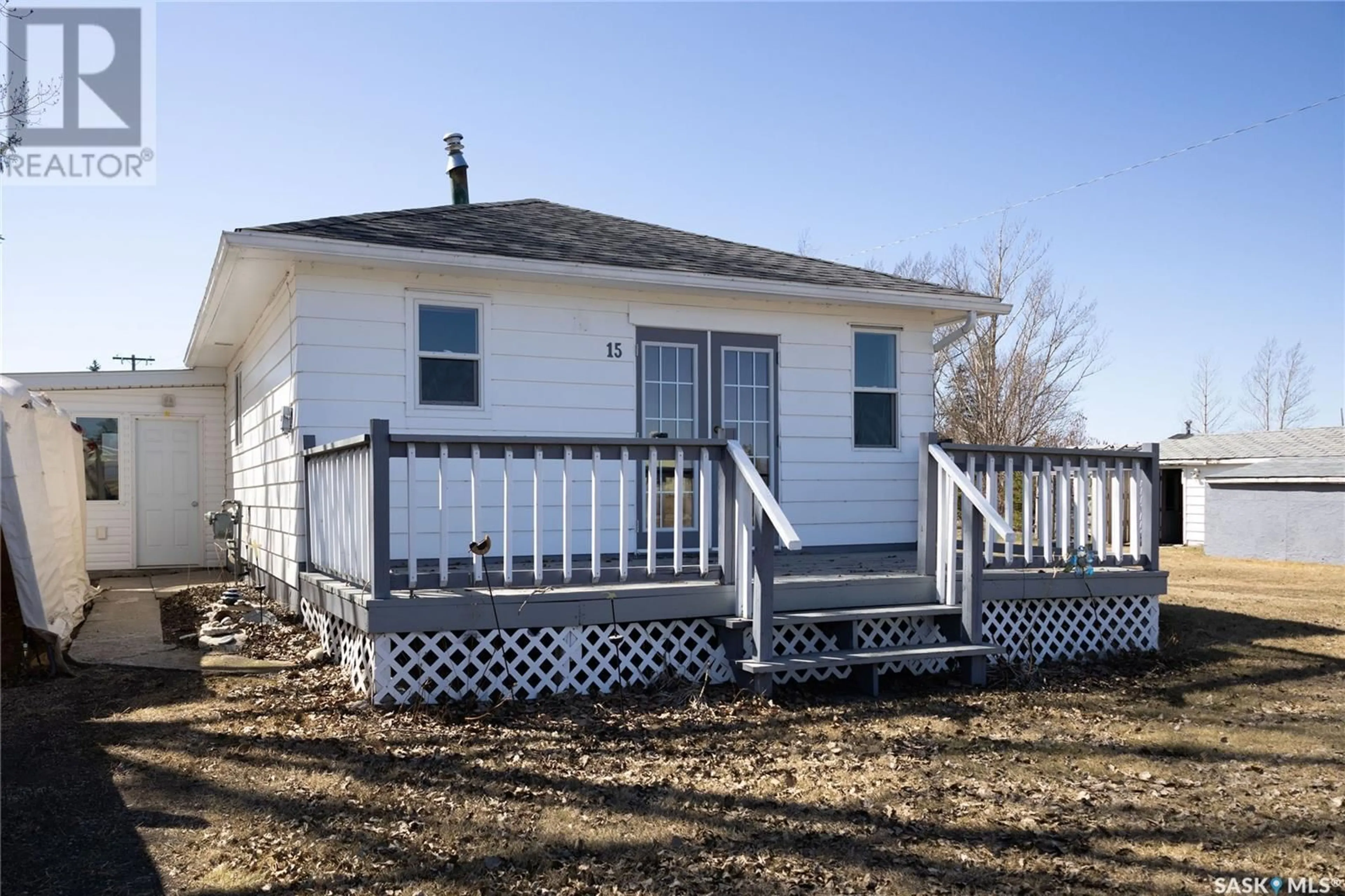 Home with vinyl exterior material, street for 15 ST GEORGE AVENUE, Prud'homme Saskatchewan S0K3K0