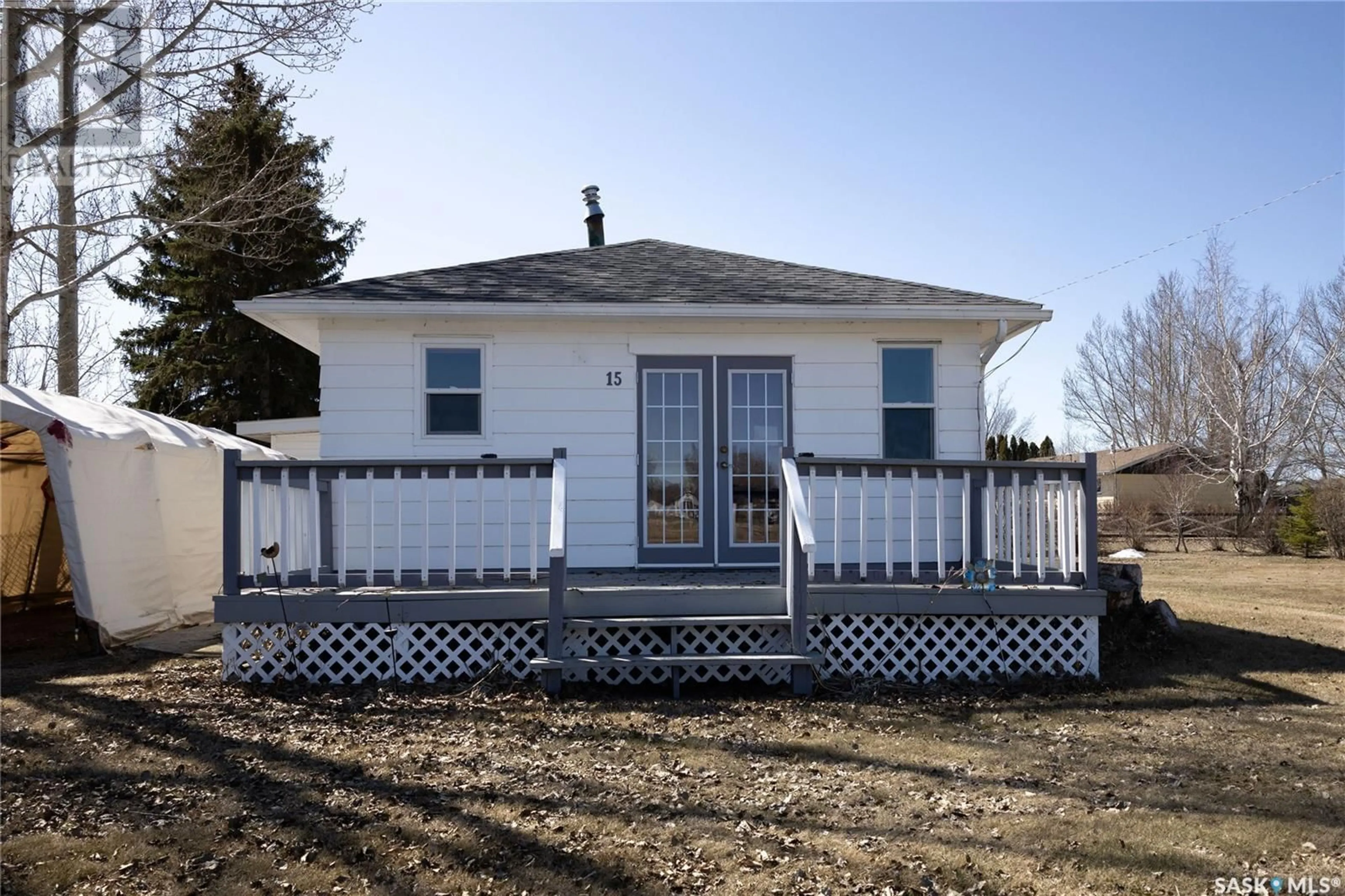 Home with vinyl exterior material, street for 15 ST GEORGE AVENUE, Prud'homme Saskatchewan S0K3K0