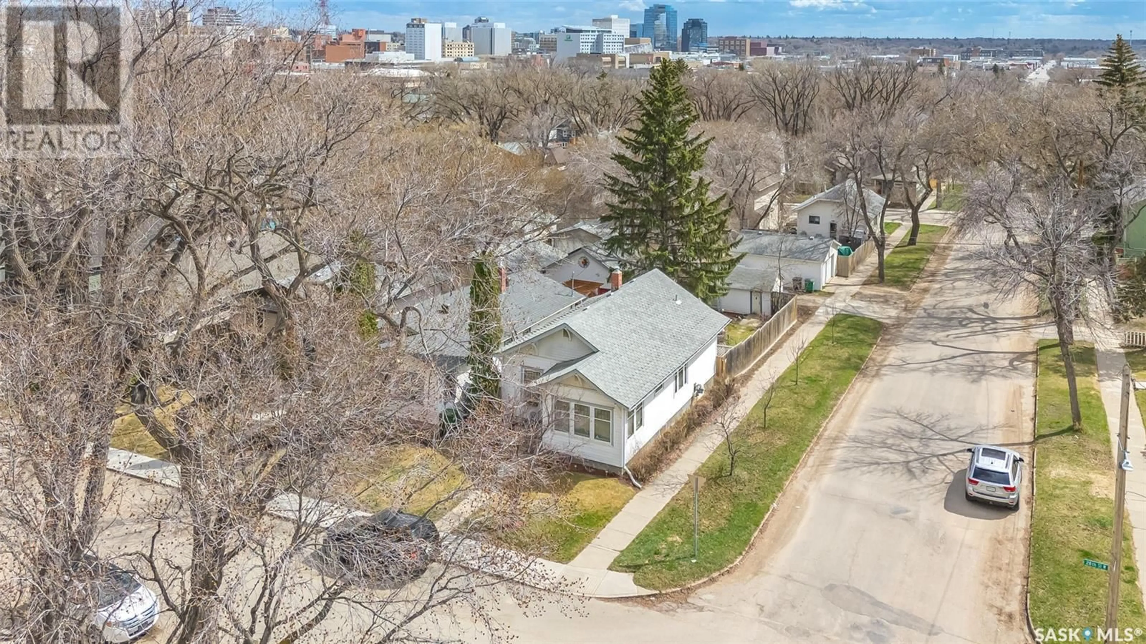 A pic from outside/outdoor area/front of a property/back of a property/a pic from drone, unknown for 219 28TH STREET, Saskatoon Saskatchewan S7L0K4