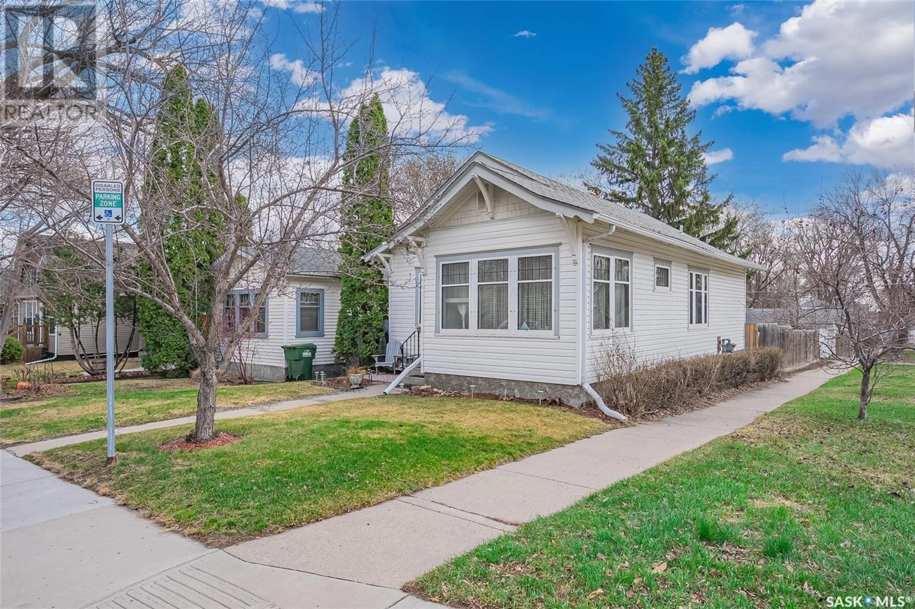 Home with vinyl exterior material, street for 219 28TH STREET, Saskatoon Saskatchewan S7L0K4