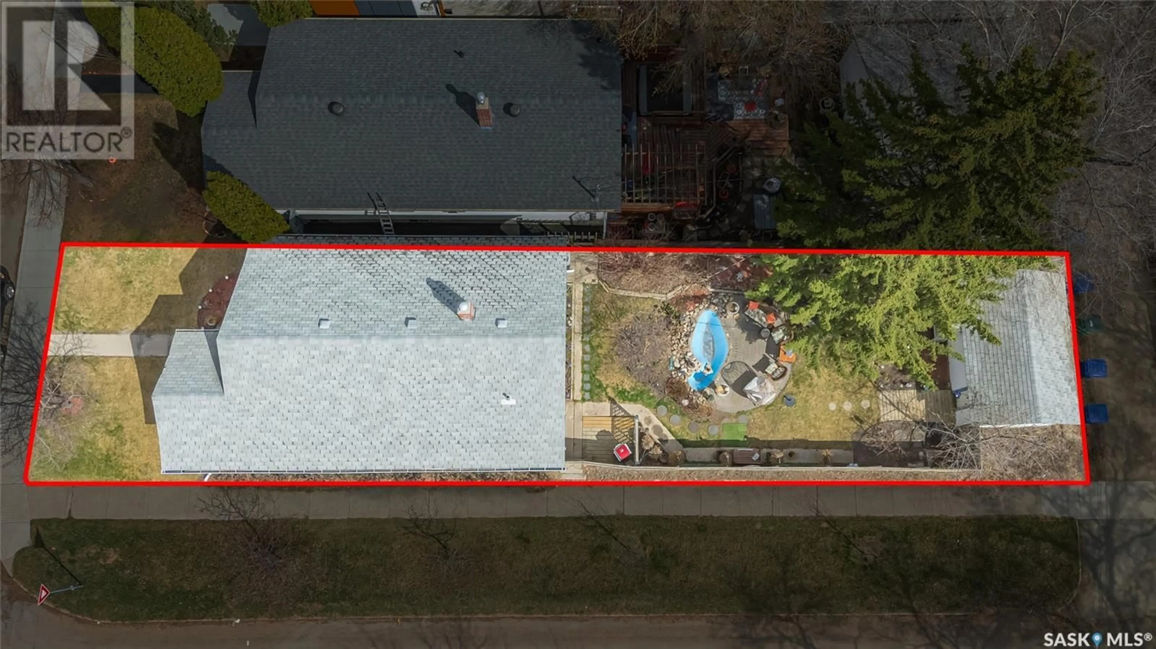A pic from outside/outdoor area/front of a property/back of a property/a pic from drone, street for 219 28TH STREET, Saskatoon Saskatchewan S7L0K4