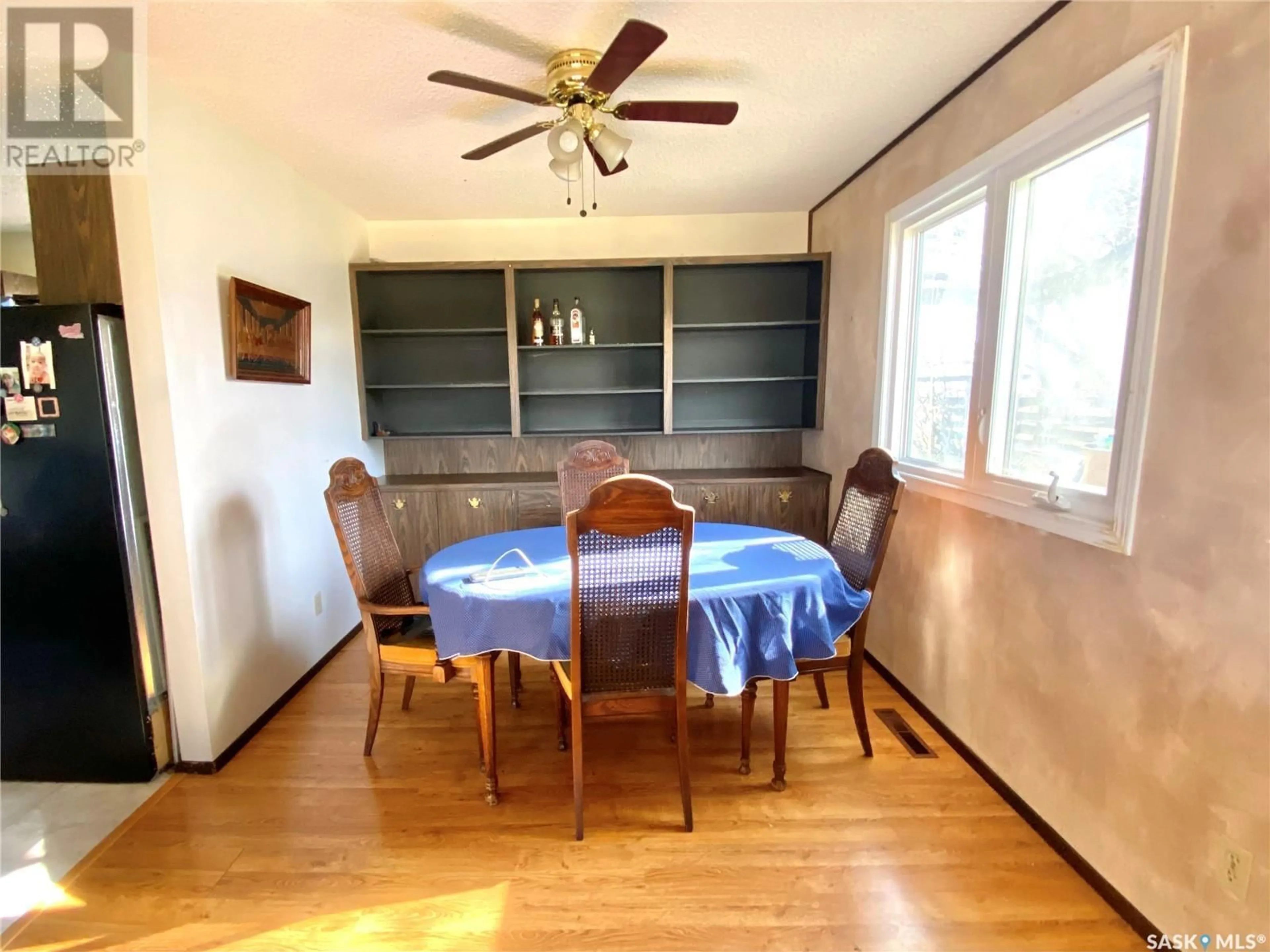 Dining room, wood/laminate floor for 209 3RD AVENUE, Frontier Saskatchewan S0N0W0