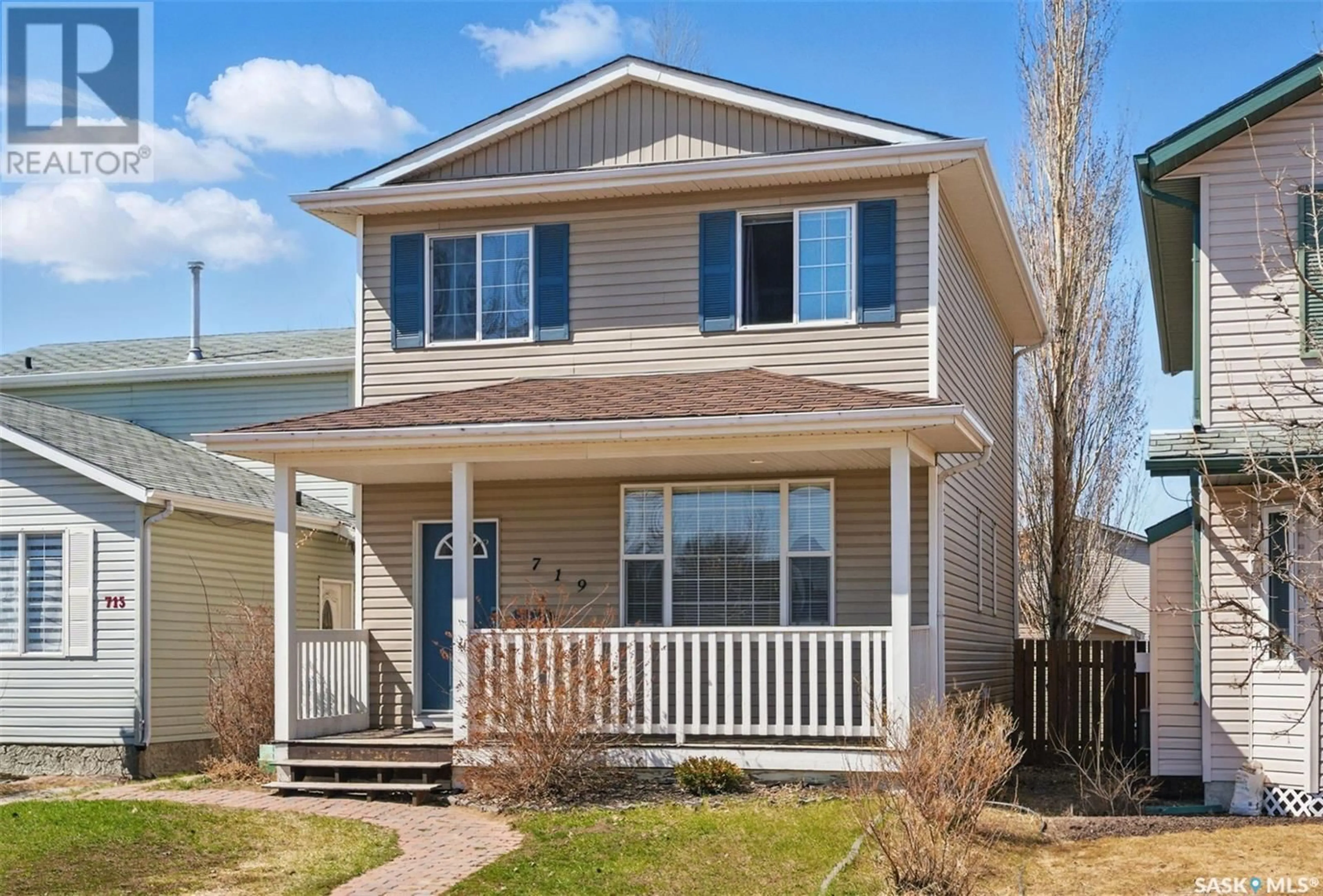 Home with vinyl exterior material, street for 719 RUTHERFORD LANE, Saskatoon Saskatchewan S7N4X8