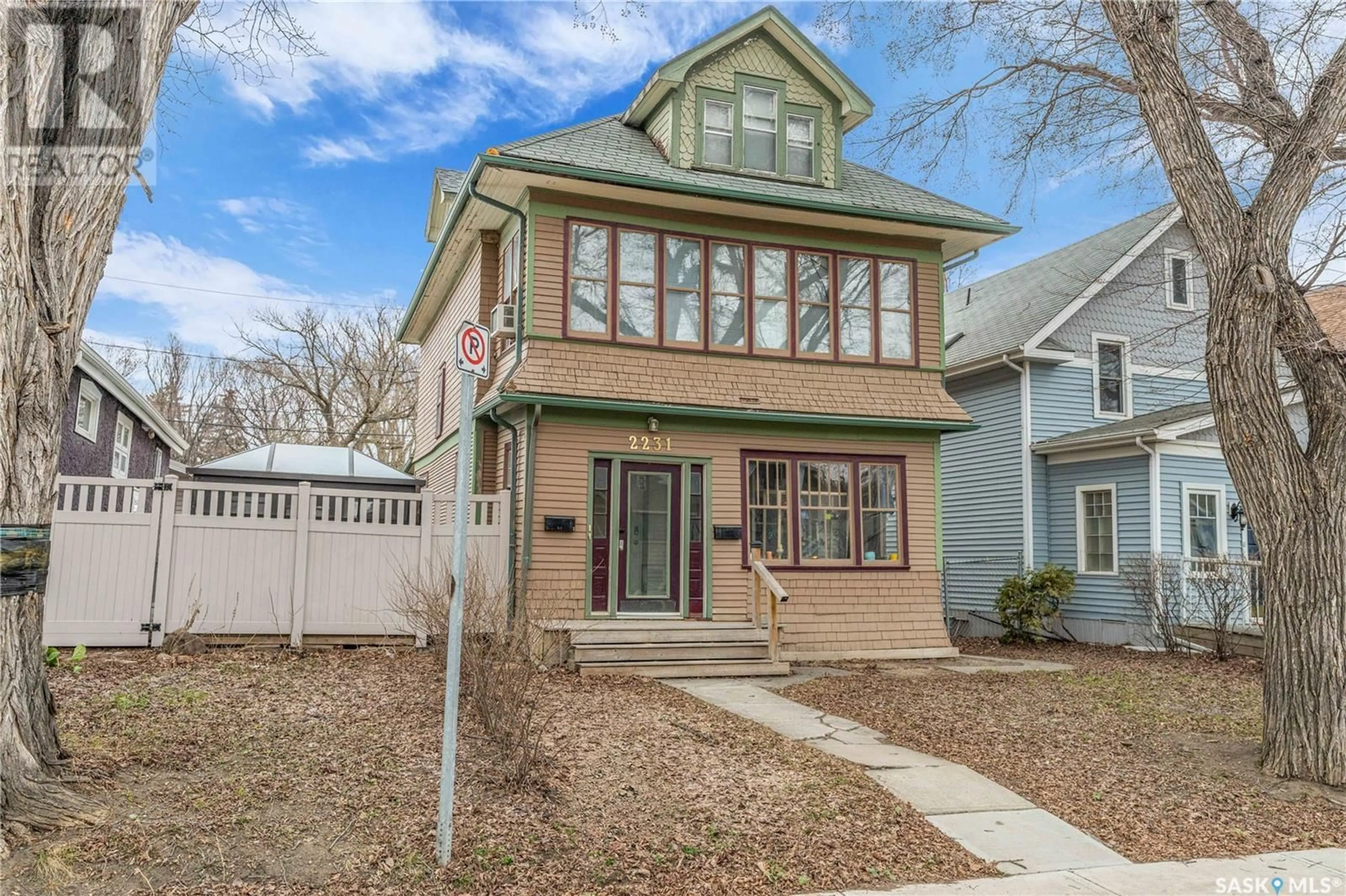 Home with vinyl exterior material, street for 2231 QUEBEC STREET, Regina Saskatchewan S4P1K3