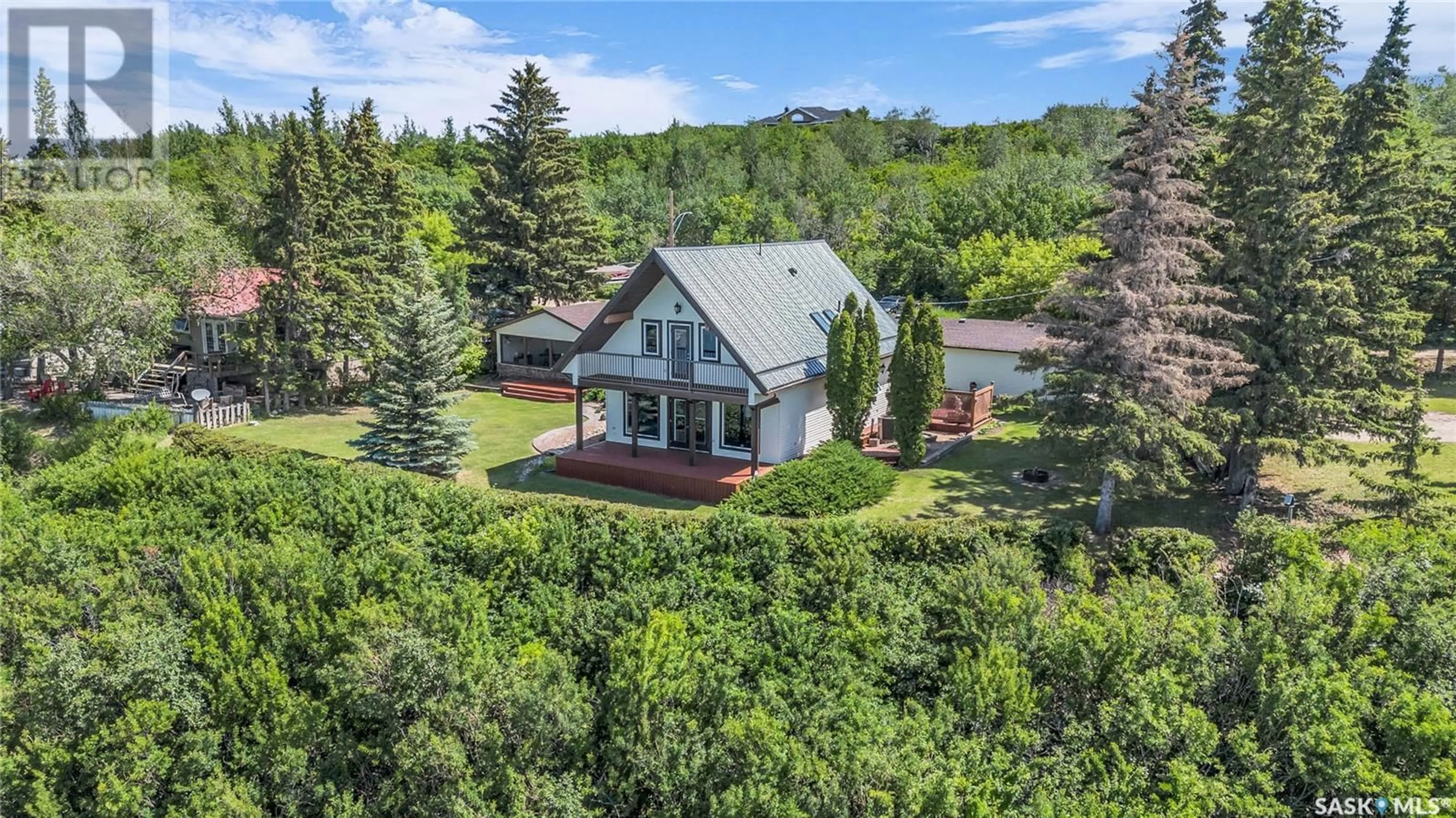 A pic from outside/outdoor area/front of a property/back of a property/a pic from drone, unknown for 8612 ARCHDEKIN DRIVE, Cochin Saskatchewan S0M0L0