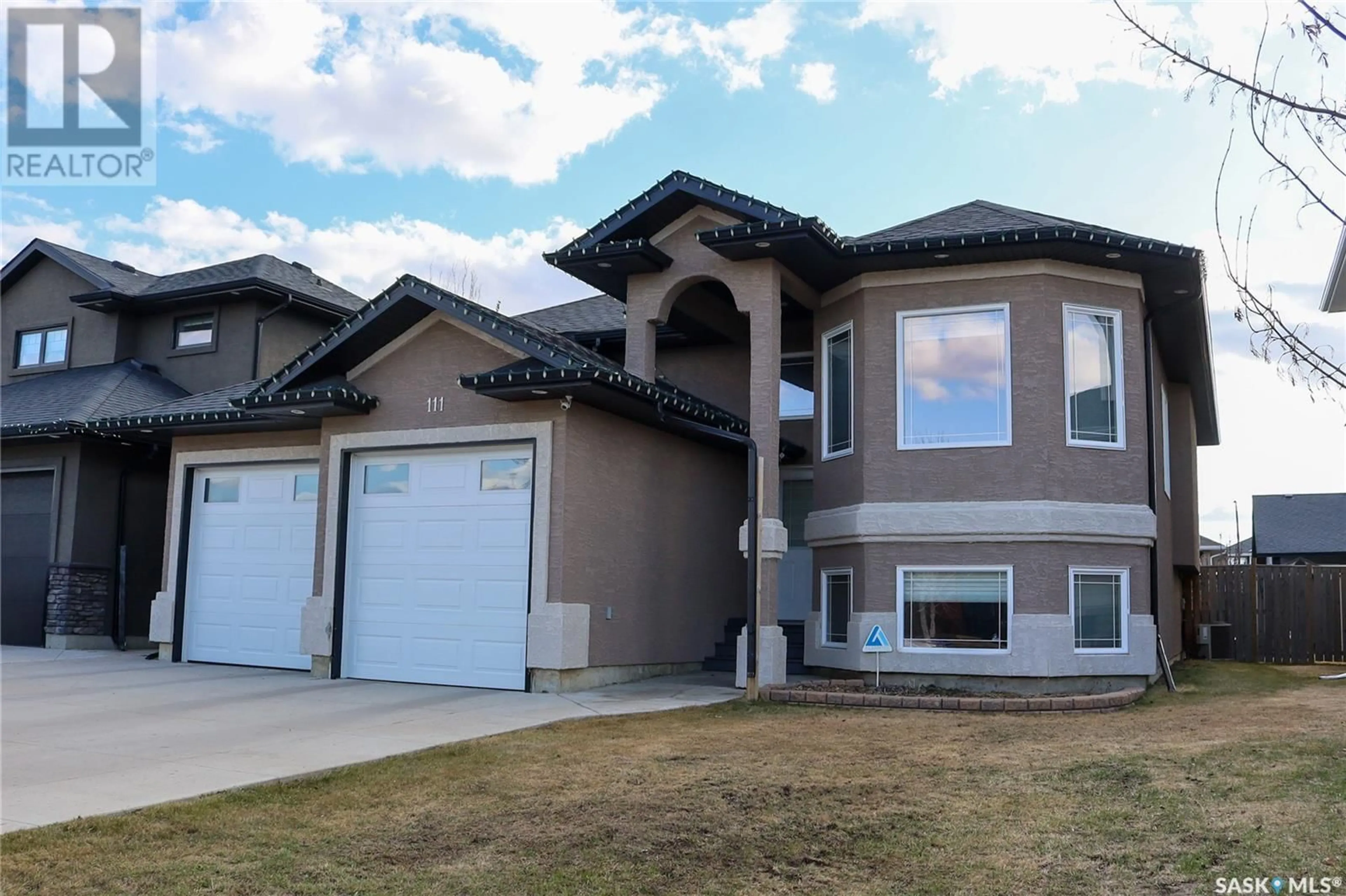 Home with vinyl exterior material, street for 111 STEFANIUK CRESCENT, Saskatoon Saskatchewan S7W0H6