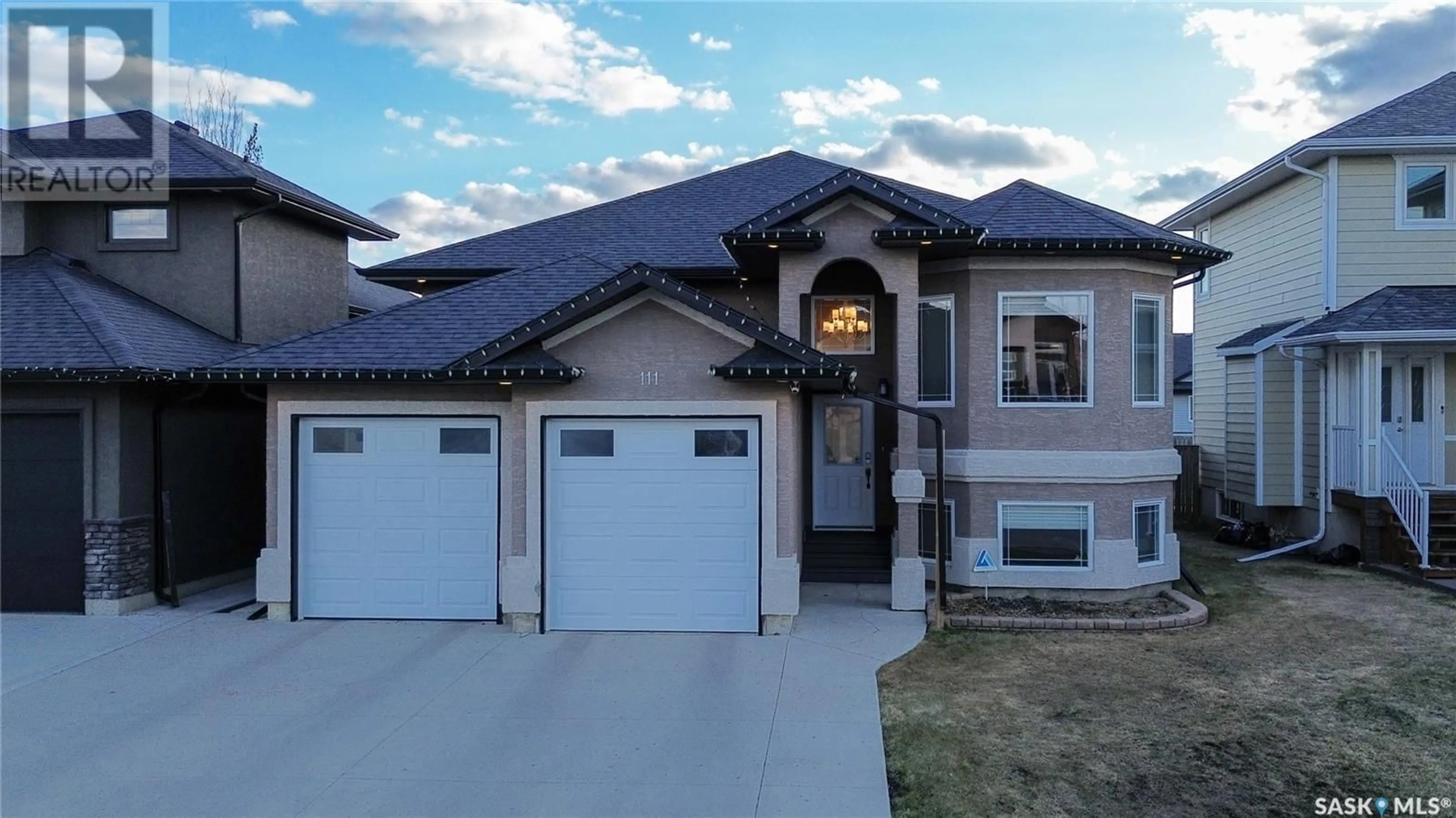 Home with vinyl exterior material, street for 111 STEFANIUK CRESCENT, Saskatoon Saskatchewan S7W0H6