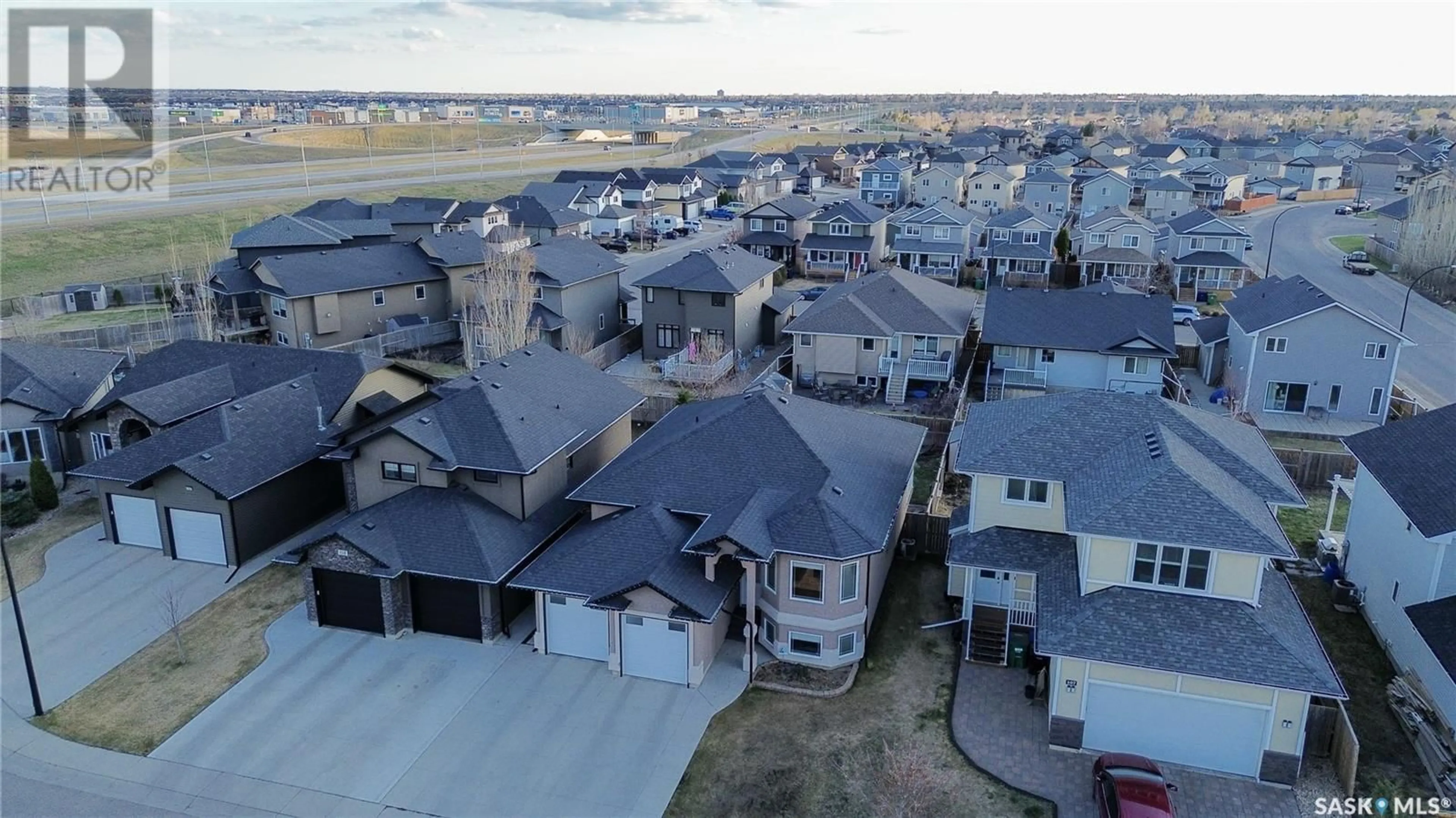 A pic from outside/outdoor area/front of a property/back of a property/a pic from drone, unknown for 111 STEFANIUK CRESCENT, Saskatoon Saskatchewan S7W0H6