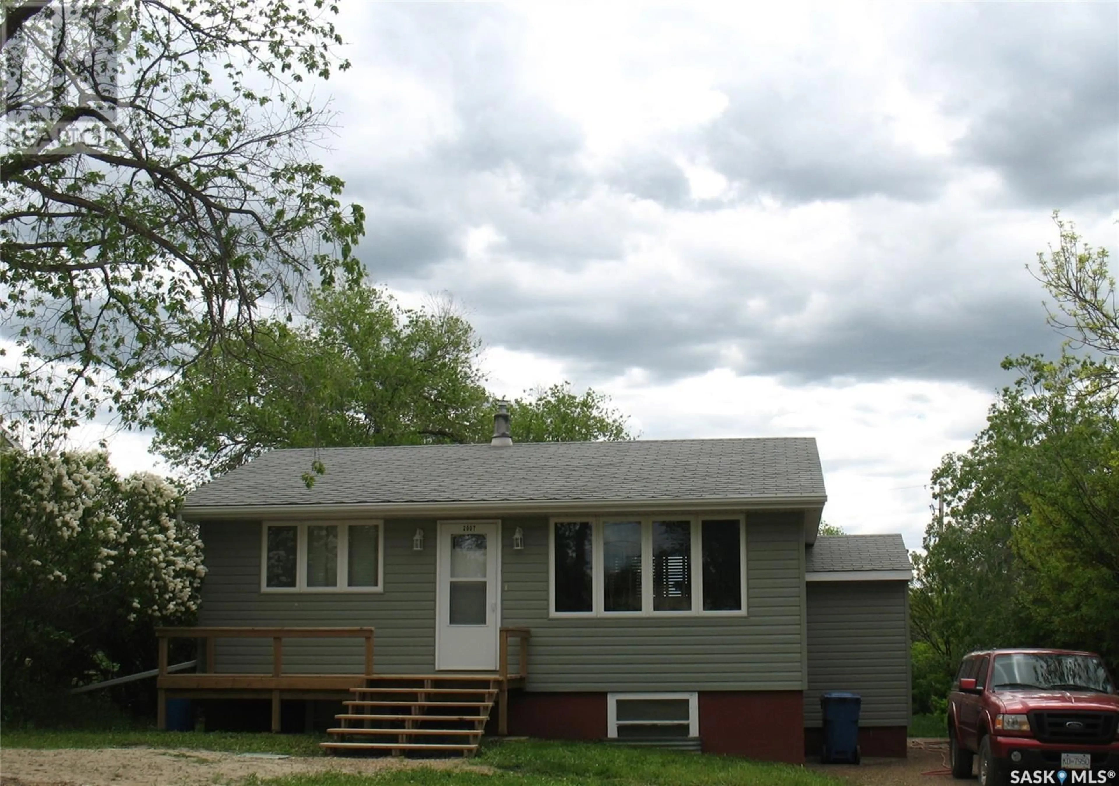 Home with vinyl exterior material, street for 2007 1ST STREET, Rockglen Saskatchewan S0H3R0