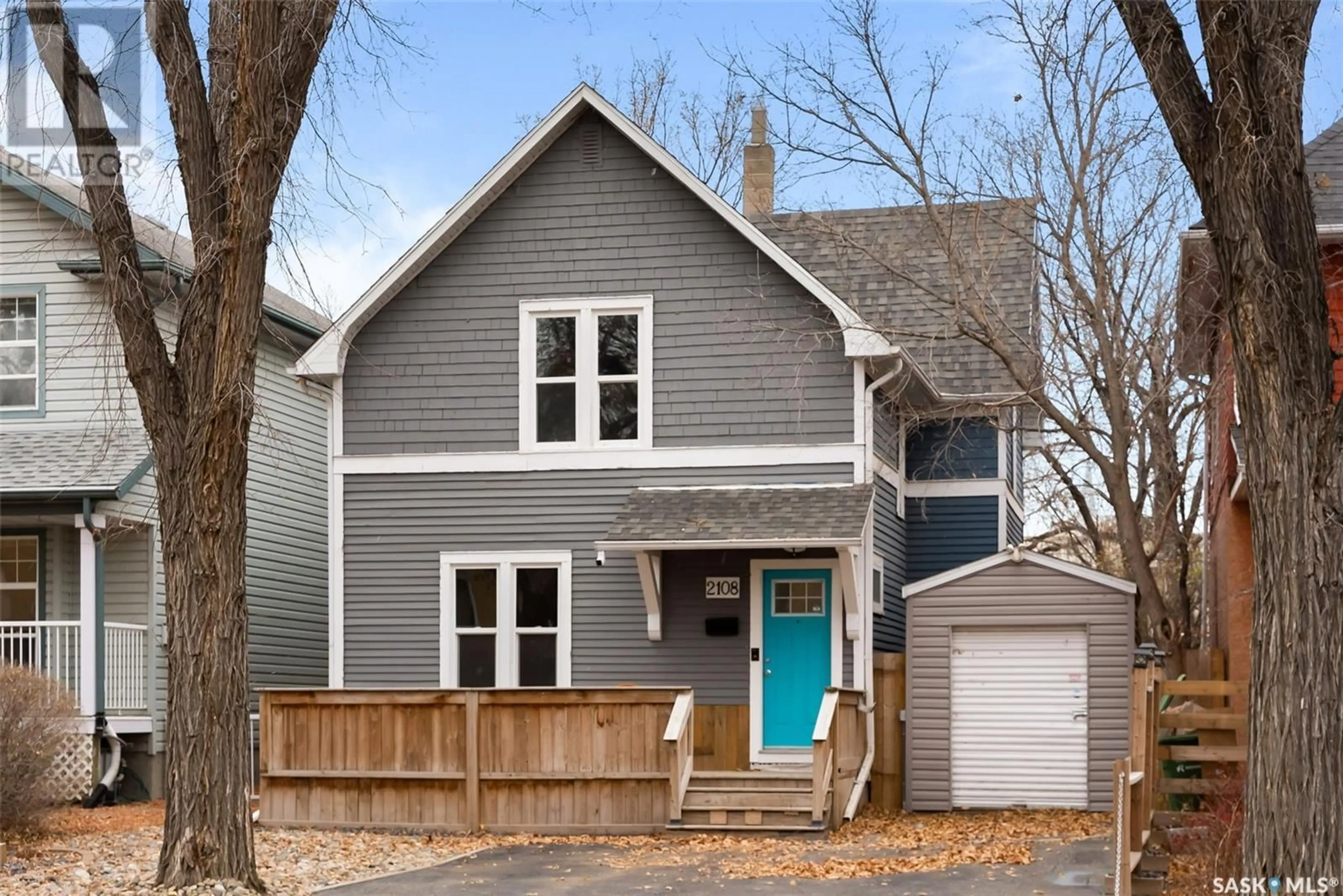 Home with vinyl exterior material, street for 2108 RAE STREET, Regina Saskatchewan S4T2E7