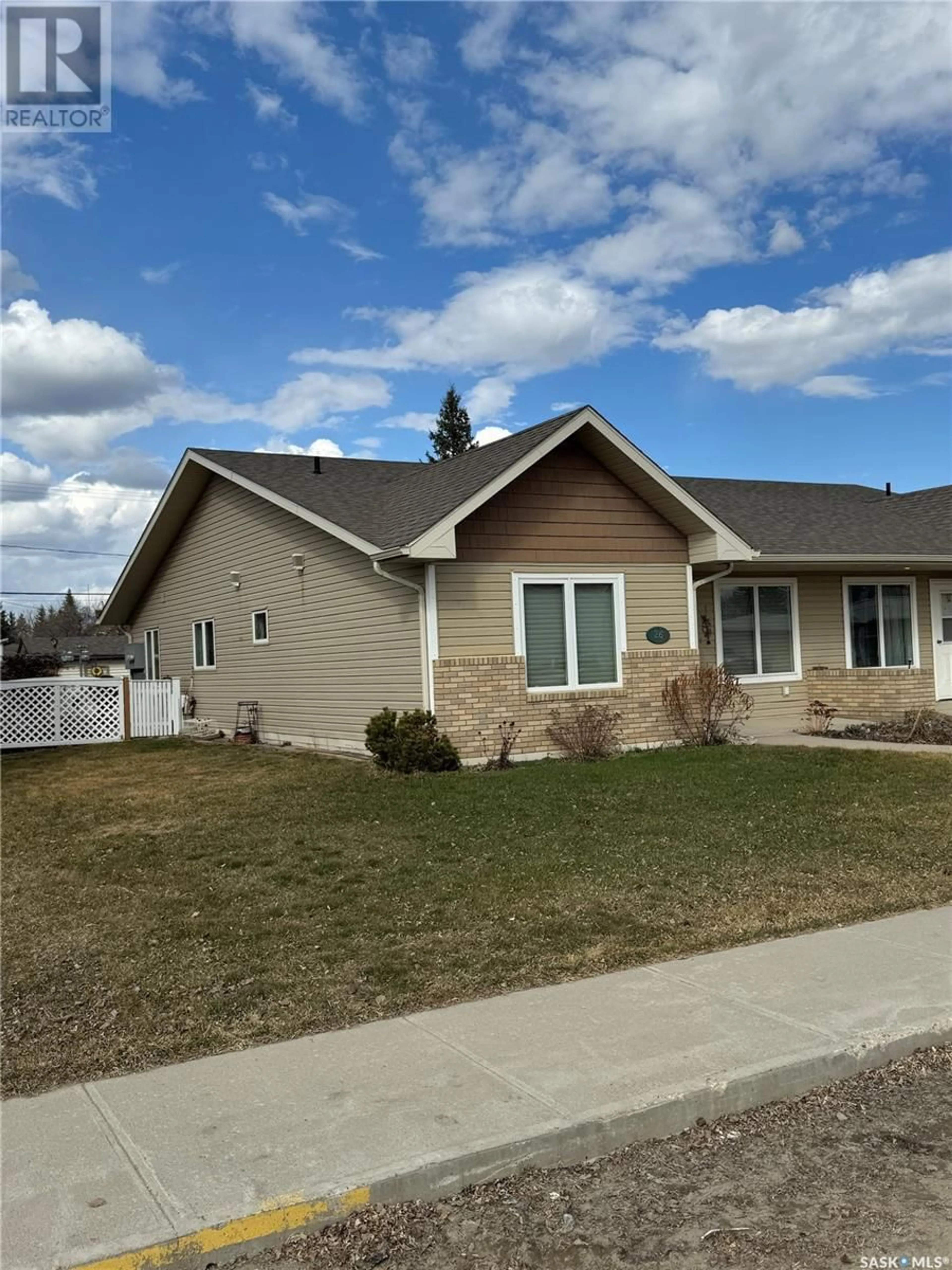 Home with vinyl exterior material, street for 26 2ND STREET, Leask Saskatchewan S0J1M0