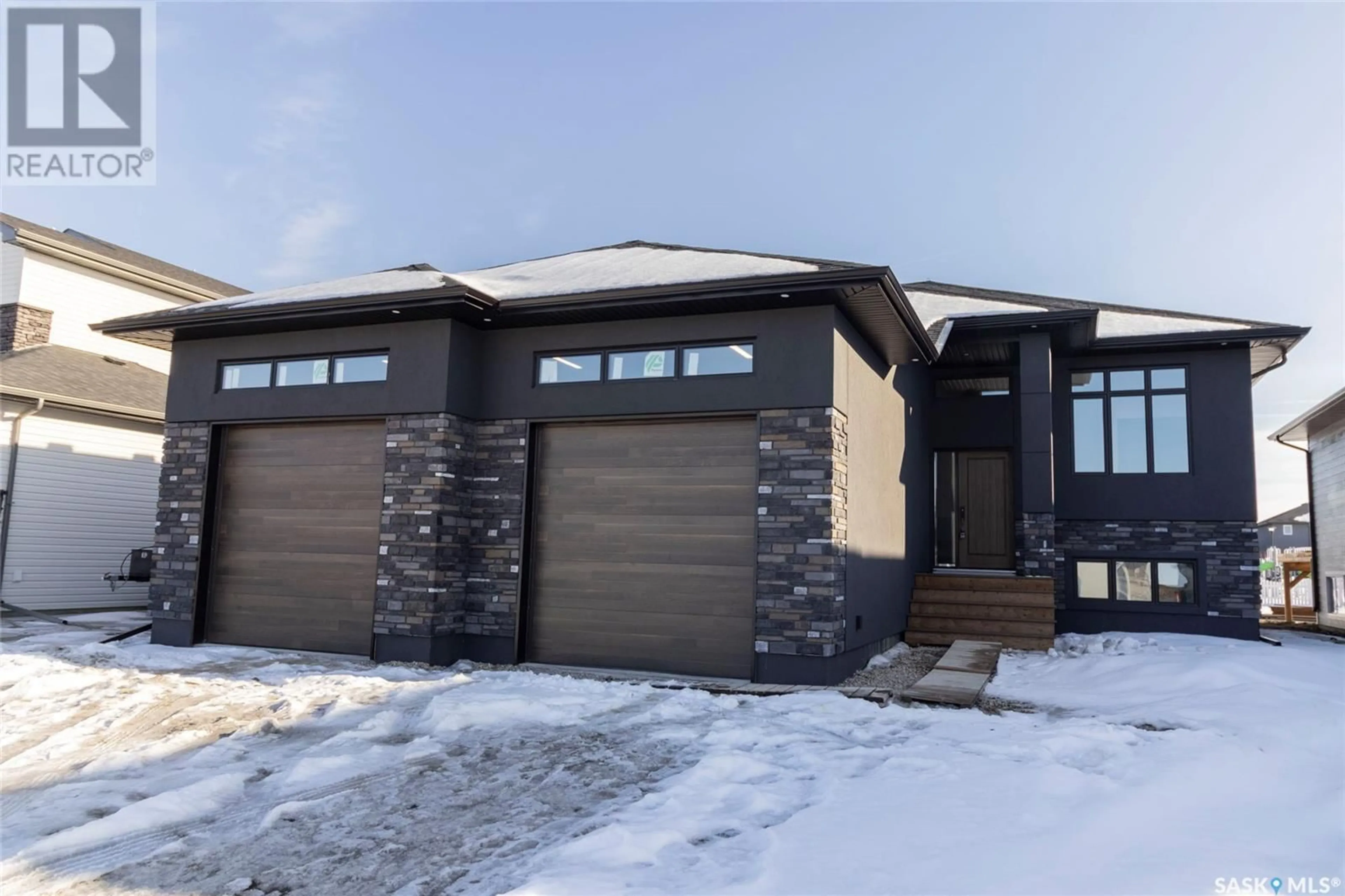 Home with brick exterior material, street for 729 SARAZEN DRIVE, Warman Saskatchewan S0K4S4
