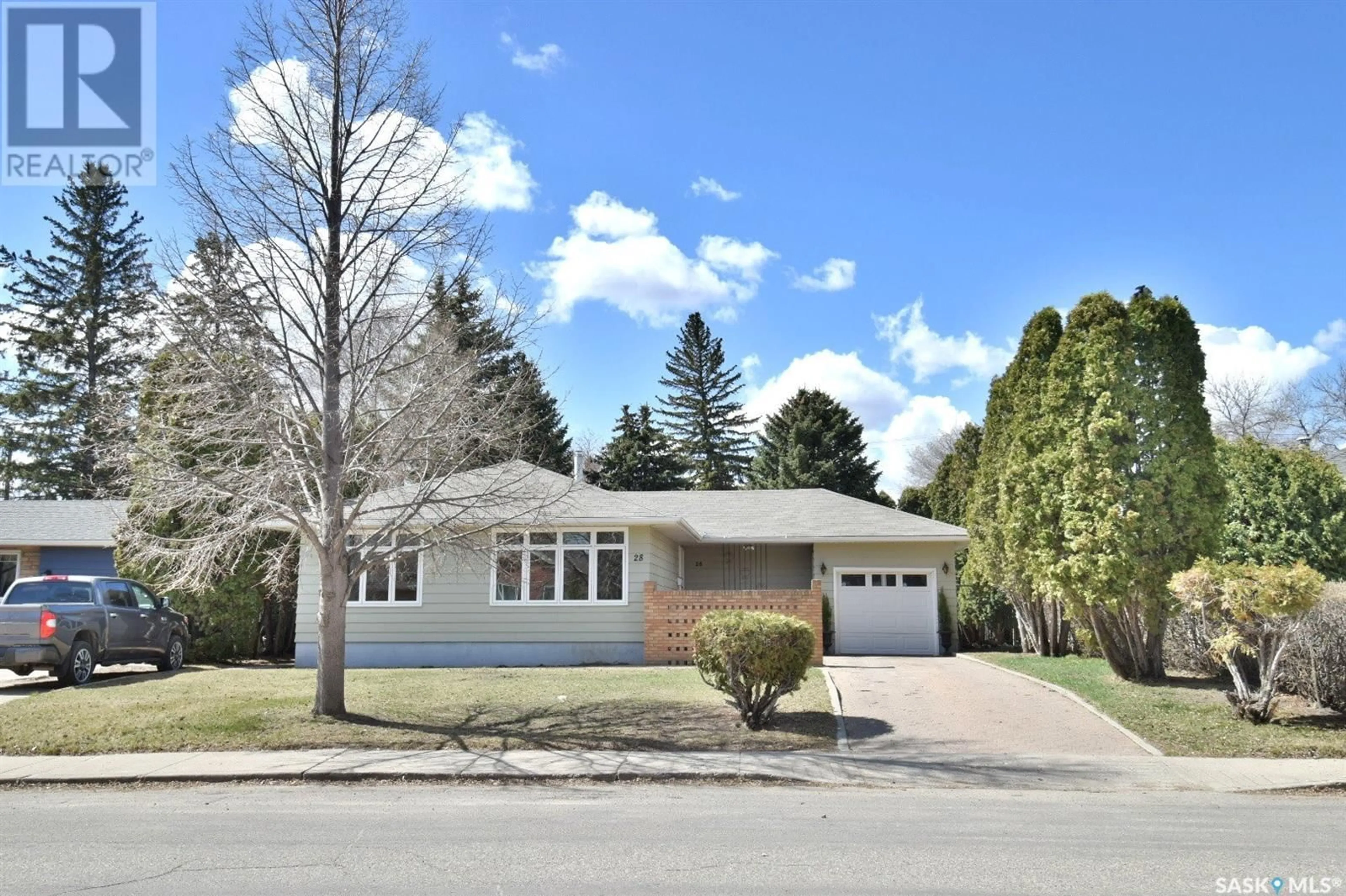 Home with vinyl exterior material, street for 28 HARRISON CRESCENT, Saskatoon Saskatchewan S7H1H5