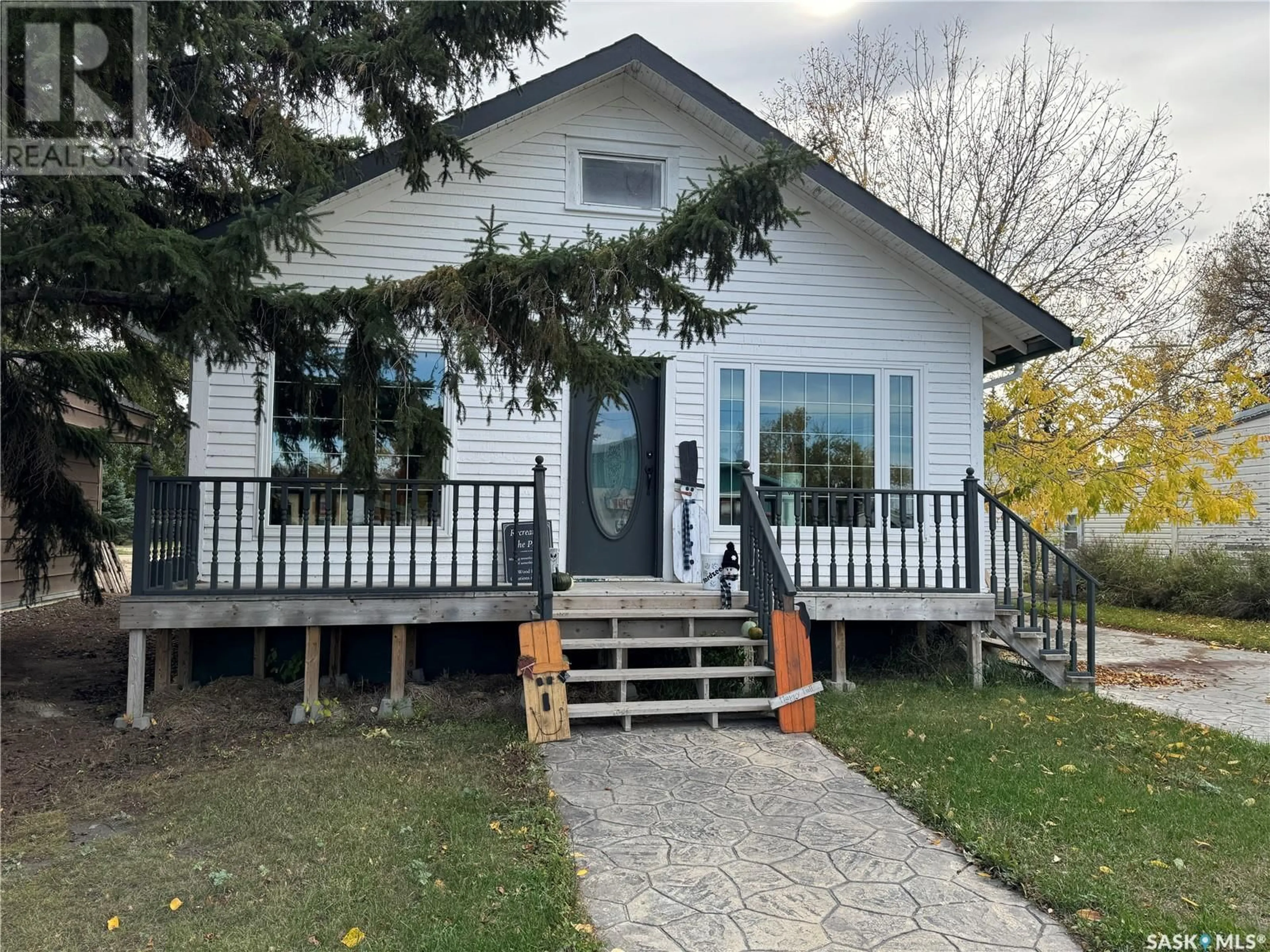 Home with vinyl exterior material, street for 207 ROYAL STREET, Imperial Saskatchewan S0G2J0