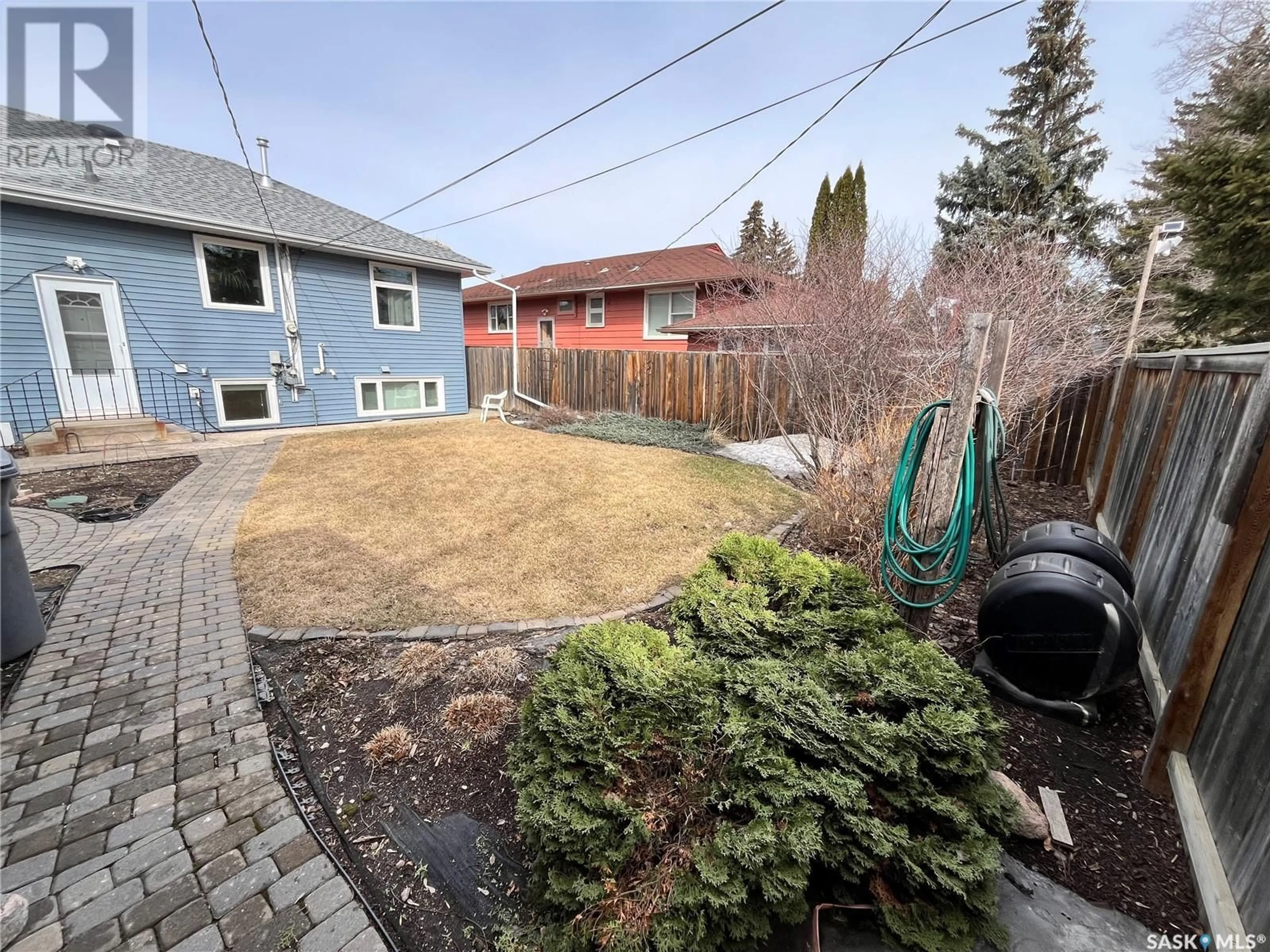 A pic from outside/outdoor area/front of a property/back of a property/a pic from drone, street for 107 BOTTOMLEY AVENUE, Saskatoon Saskatchewan S7N1K5