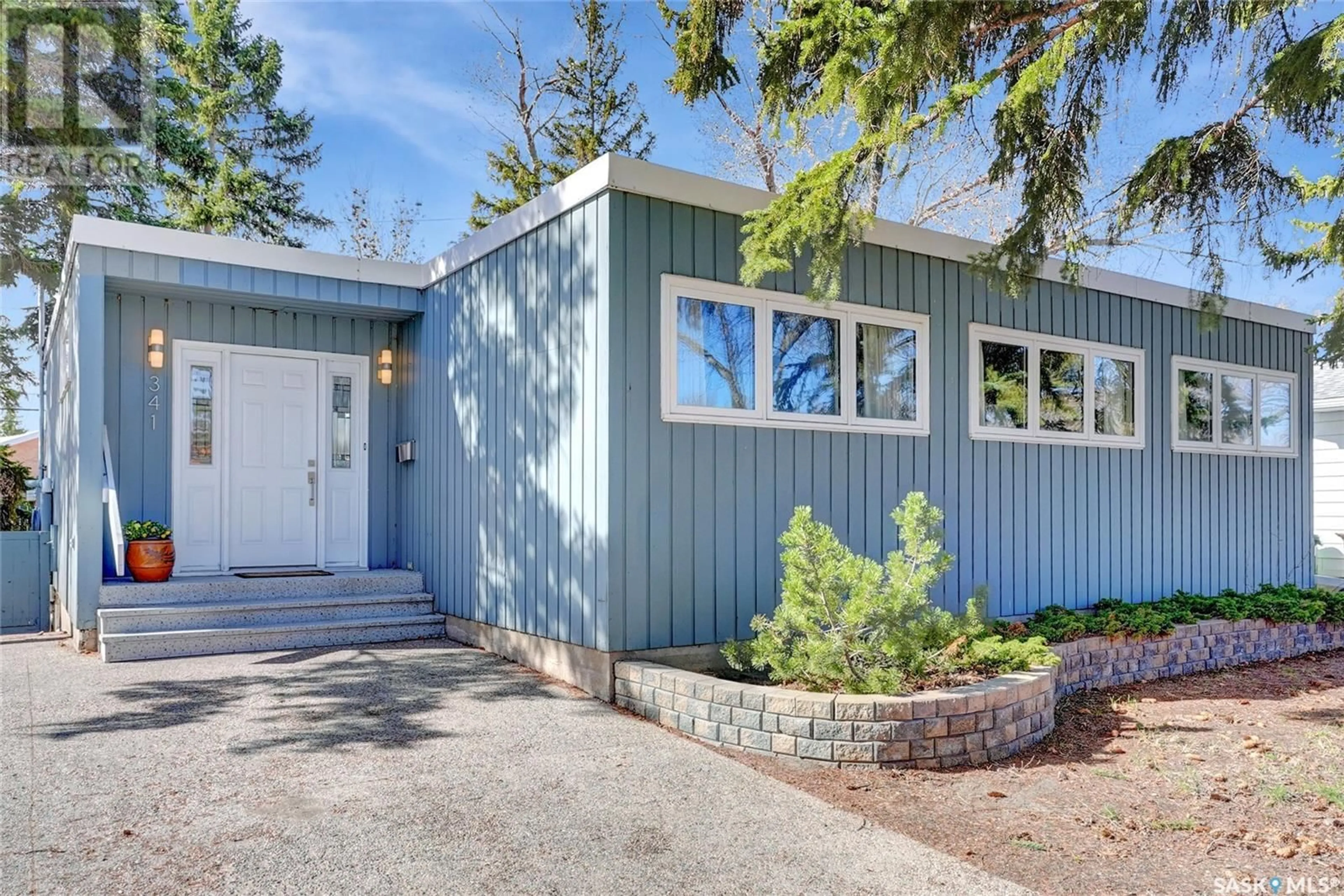 Home with vinyl exterior material, street for 341 DURHAM DRIVE, Regina Saskatchewan S4S4Z6