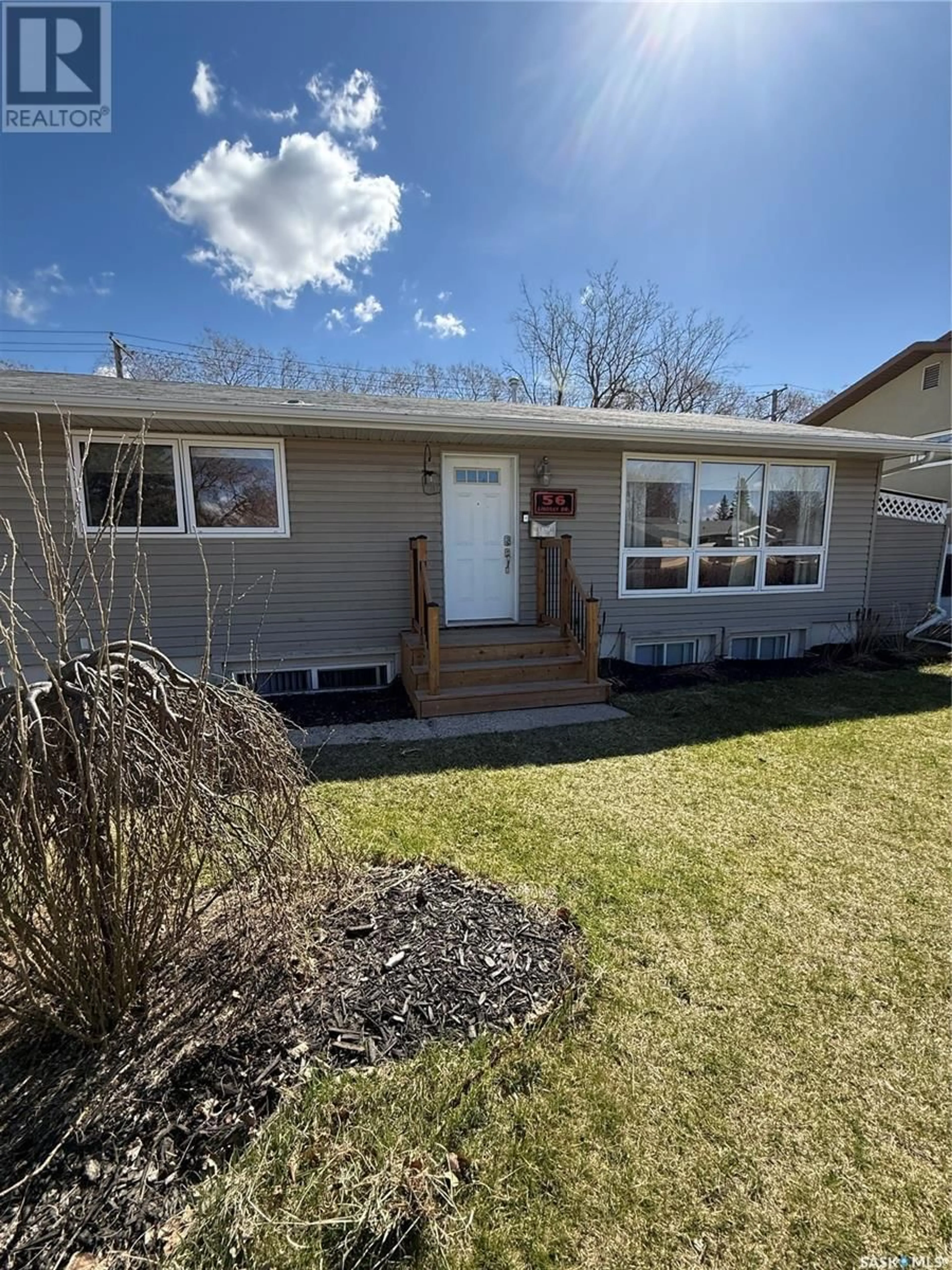 Home with vinyl exterior material, street for 56 LINDSAY DRIVE, Saskatoon Saskatchewan S7H3E1