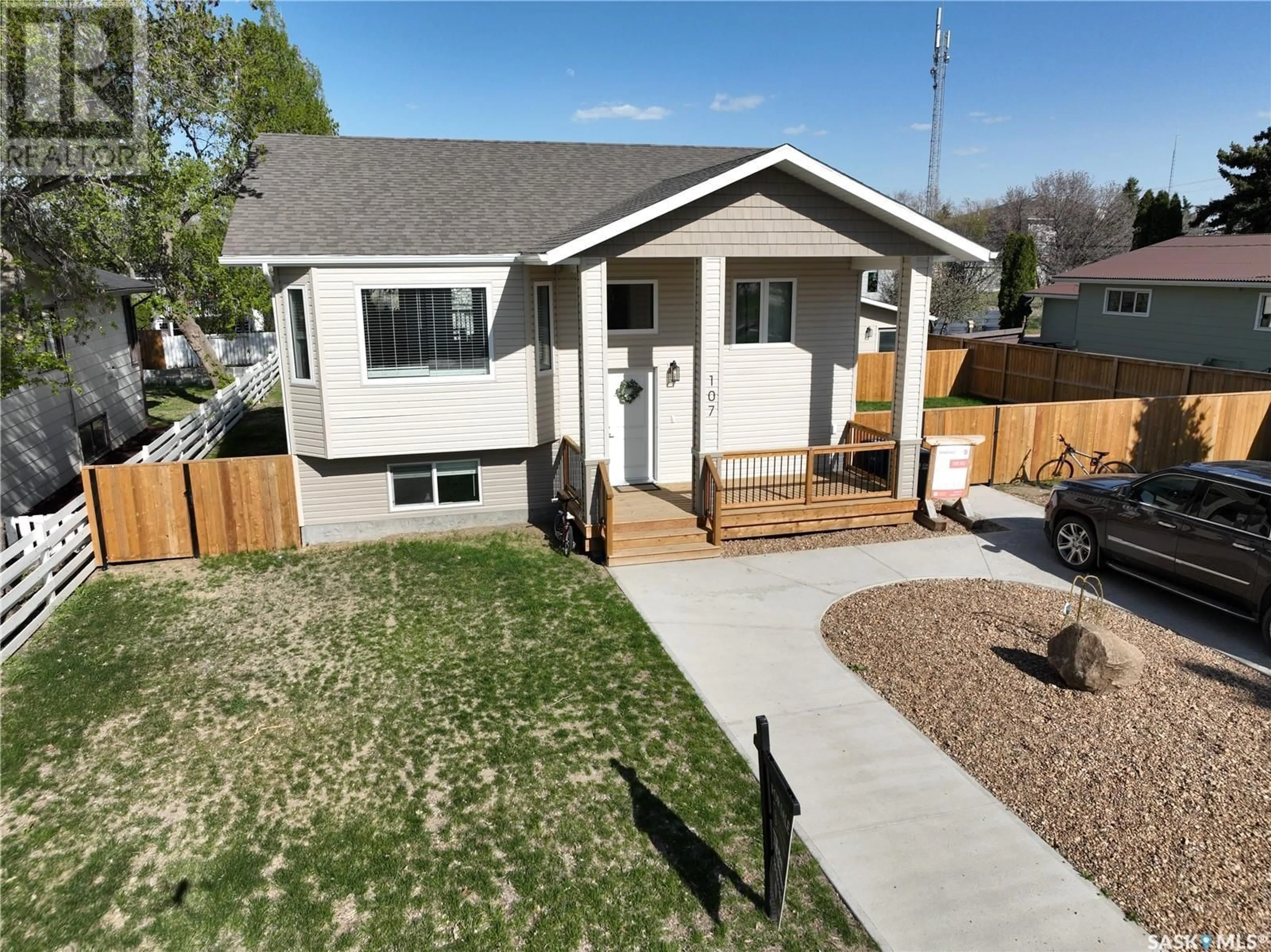 Home with vinyl exterior material, street for 107 VALLEYVIEW DRIVE, Caronport Saskatchewan S0H0S0