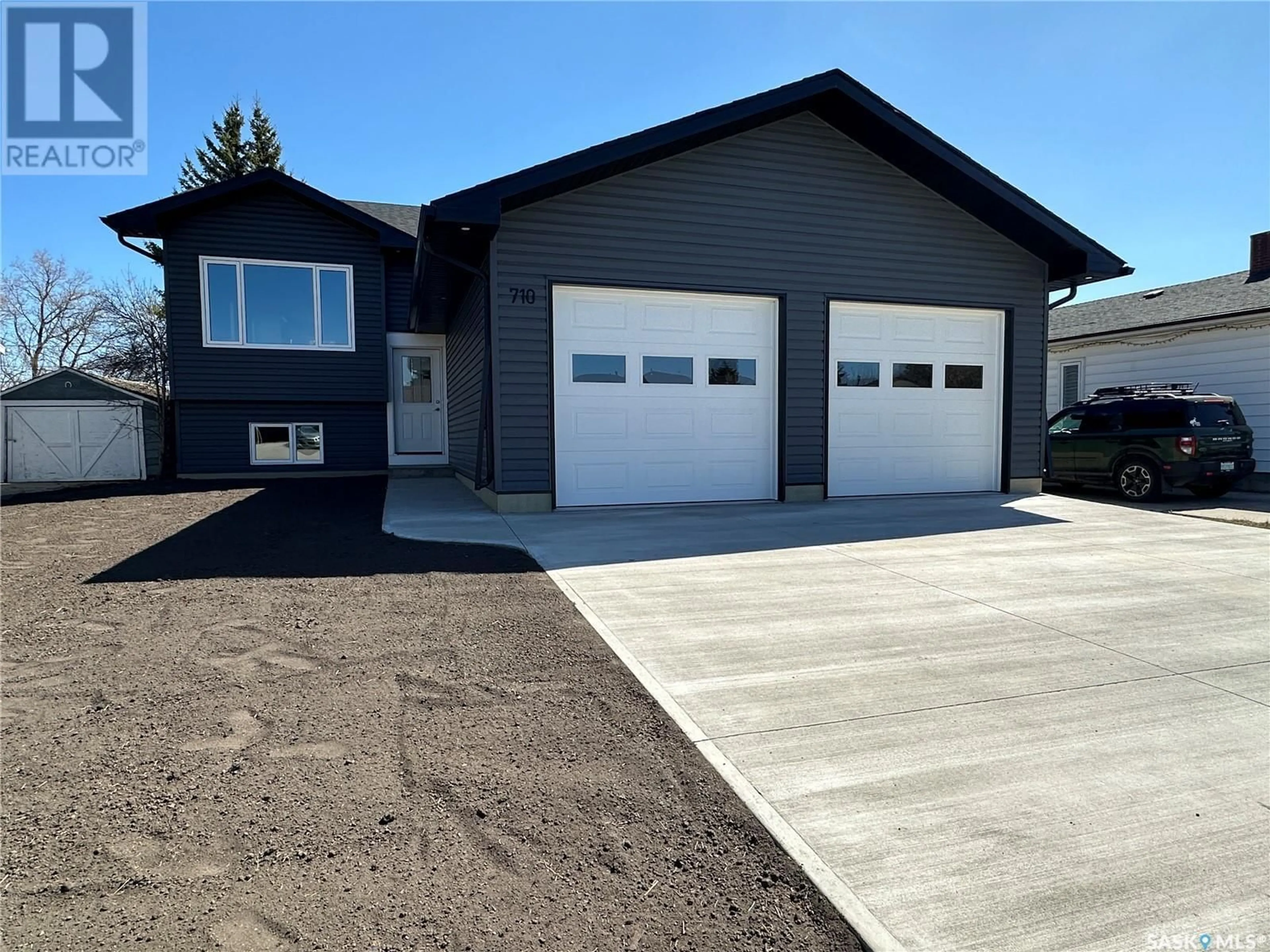 Home with vinyl exterior material, street for 710 3RD STREET, Humboldt Saskatchewan S0K2A0