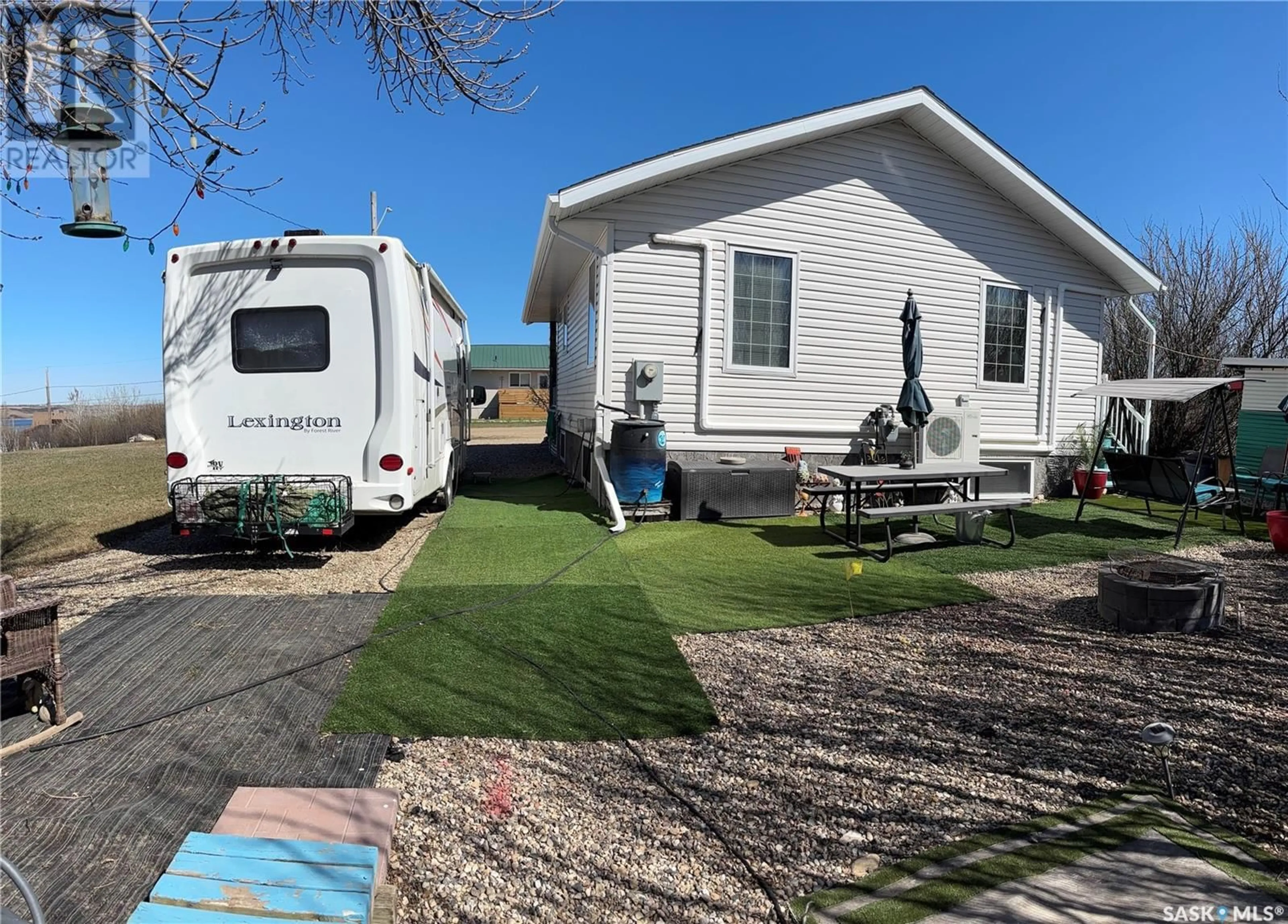 Home with vinyl exterior material, unknown for 310 WILLIAM STREET, Manitou Beach Saskatchewan S0K4T1