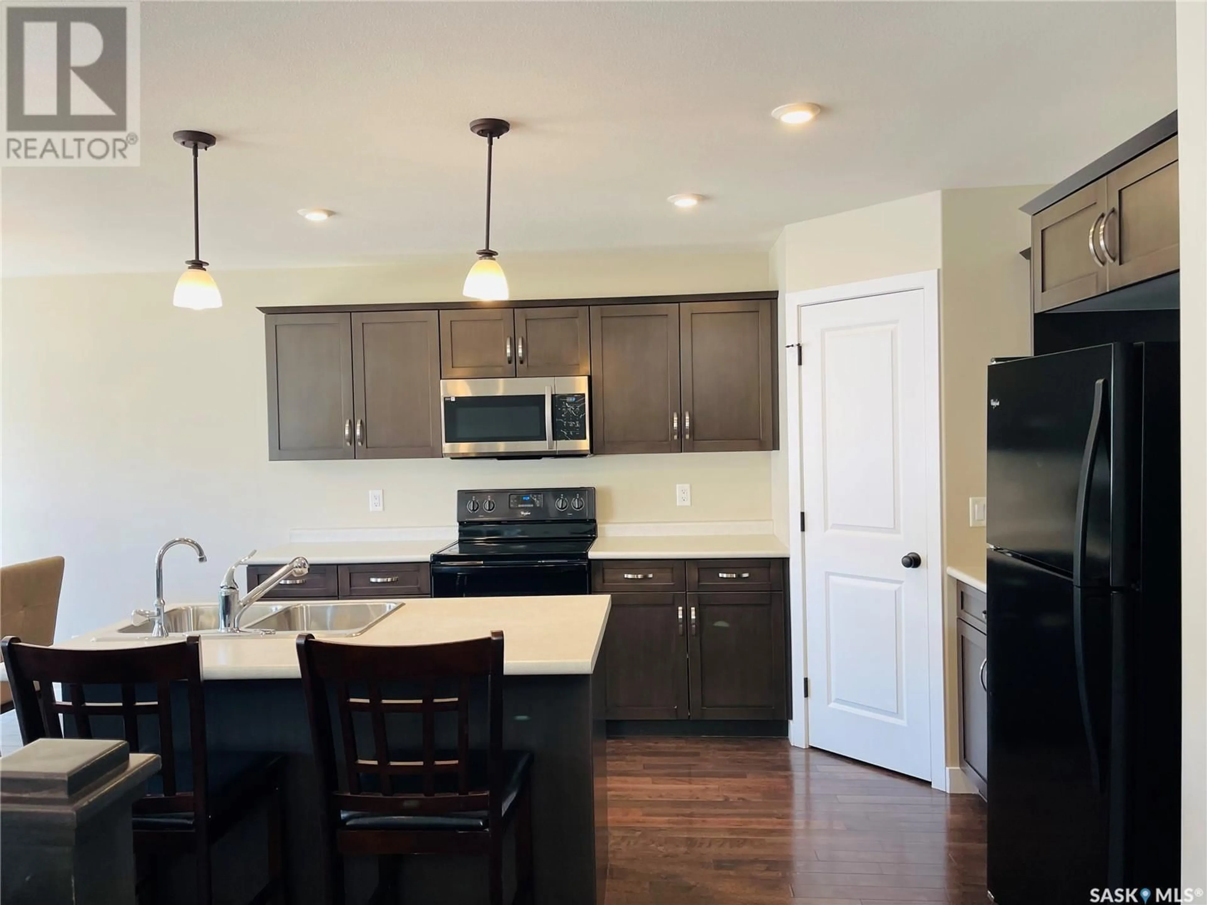 Open concept kitchen, unknown for 5657 PEARSALL CRESCENT, Regina Saskatchewan S4W0K2