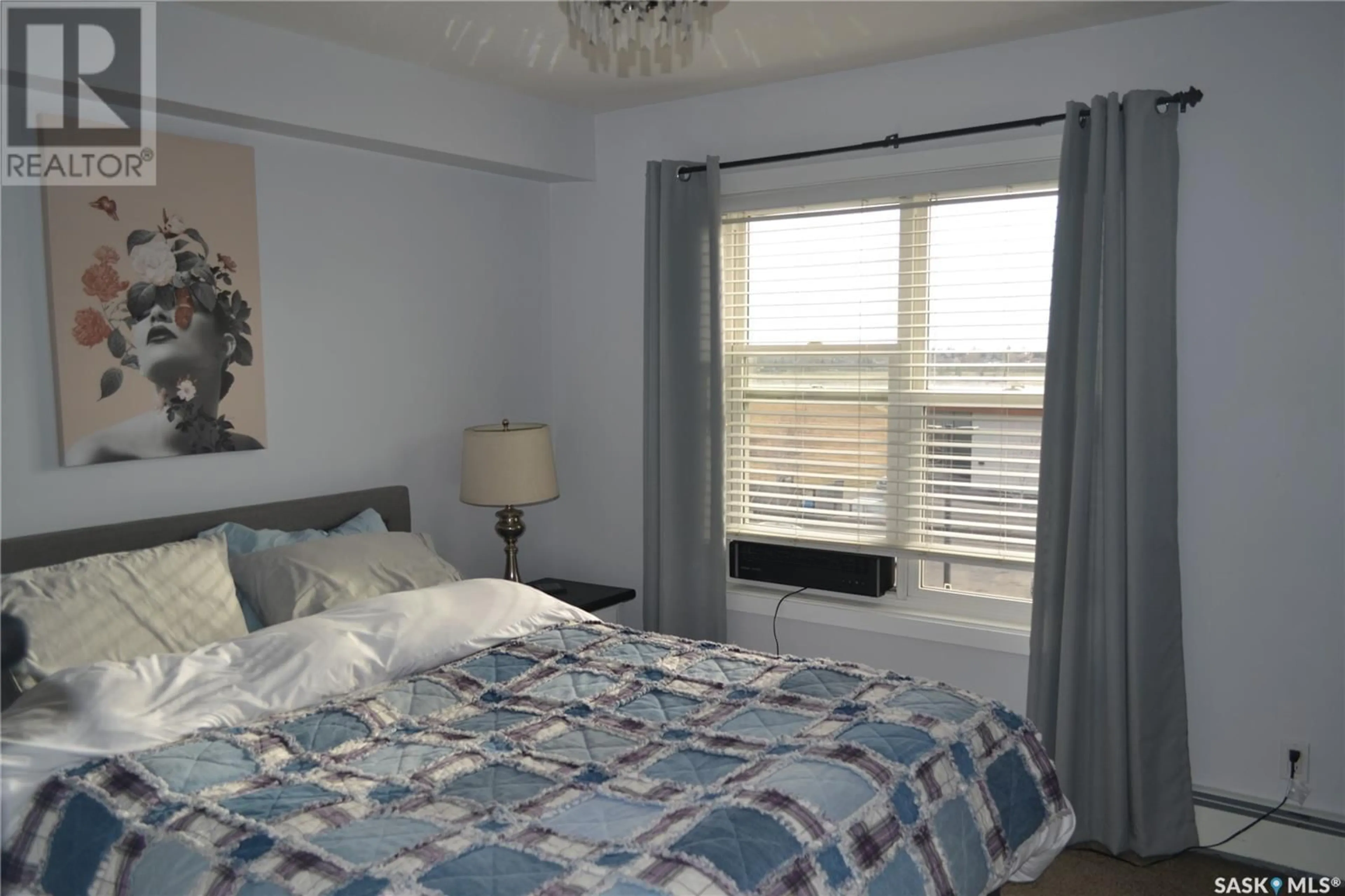 Bedroom with bed, wood/laminate floor for 230 - 406 SLIMMON ROAD, Saskatoon Saskatchewan S7V0B3