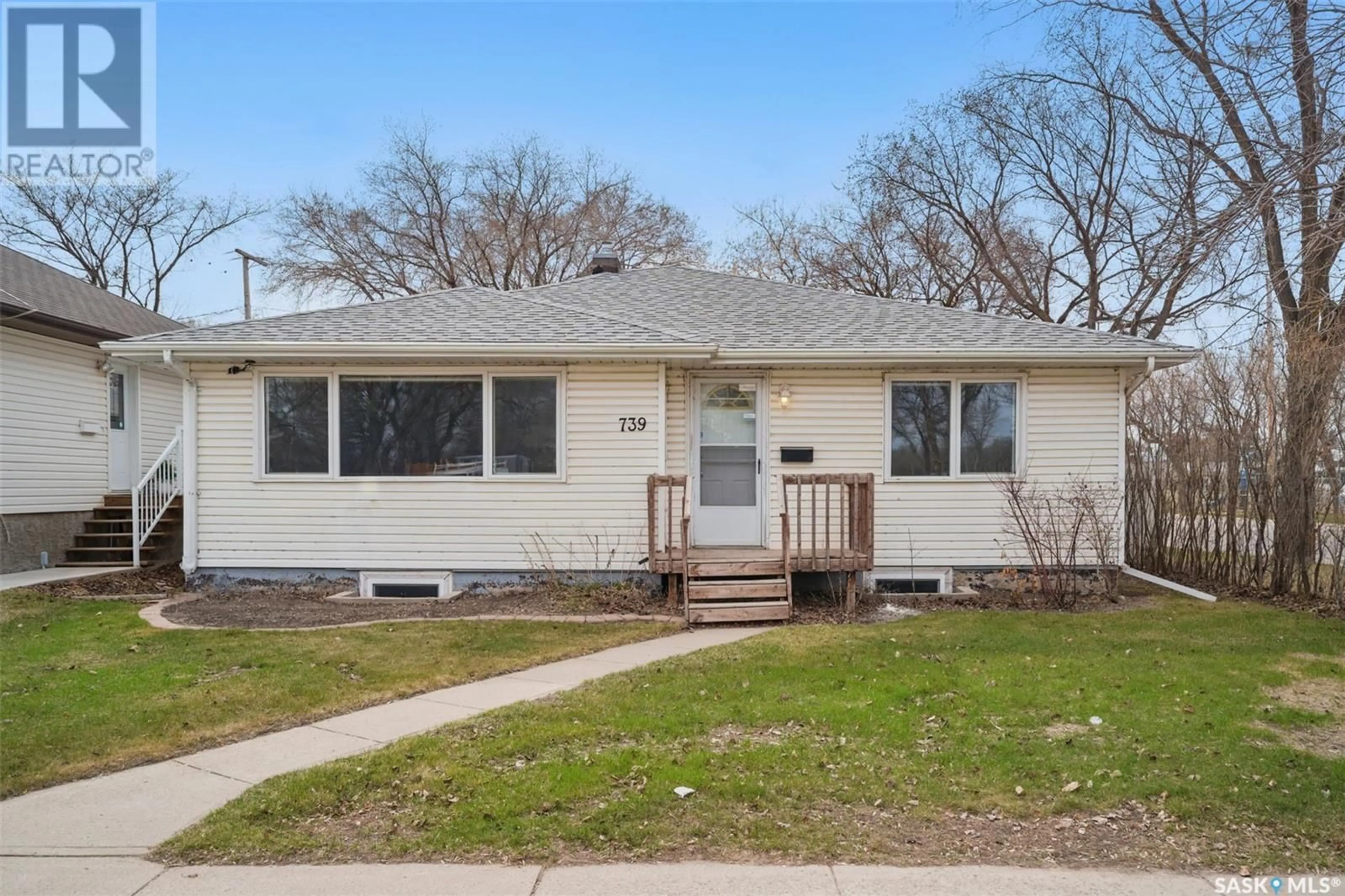 Home with vinyl exterior material, street for 739 5TH STREET, Humboldt Saskatchewan S0K2A0