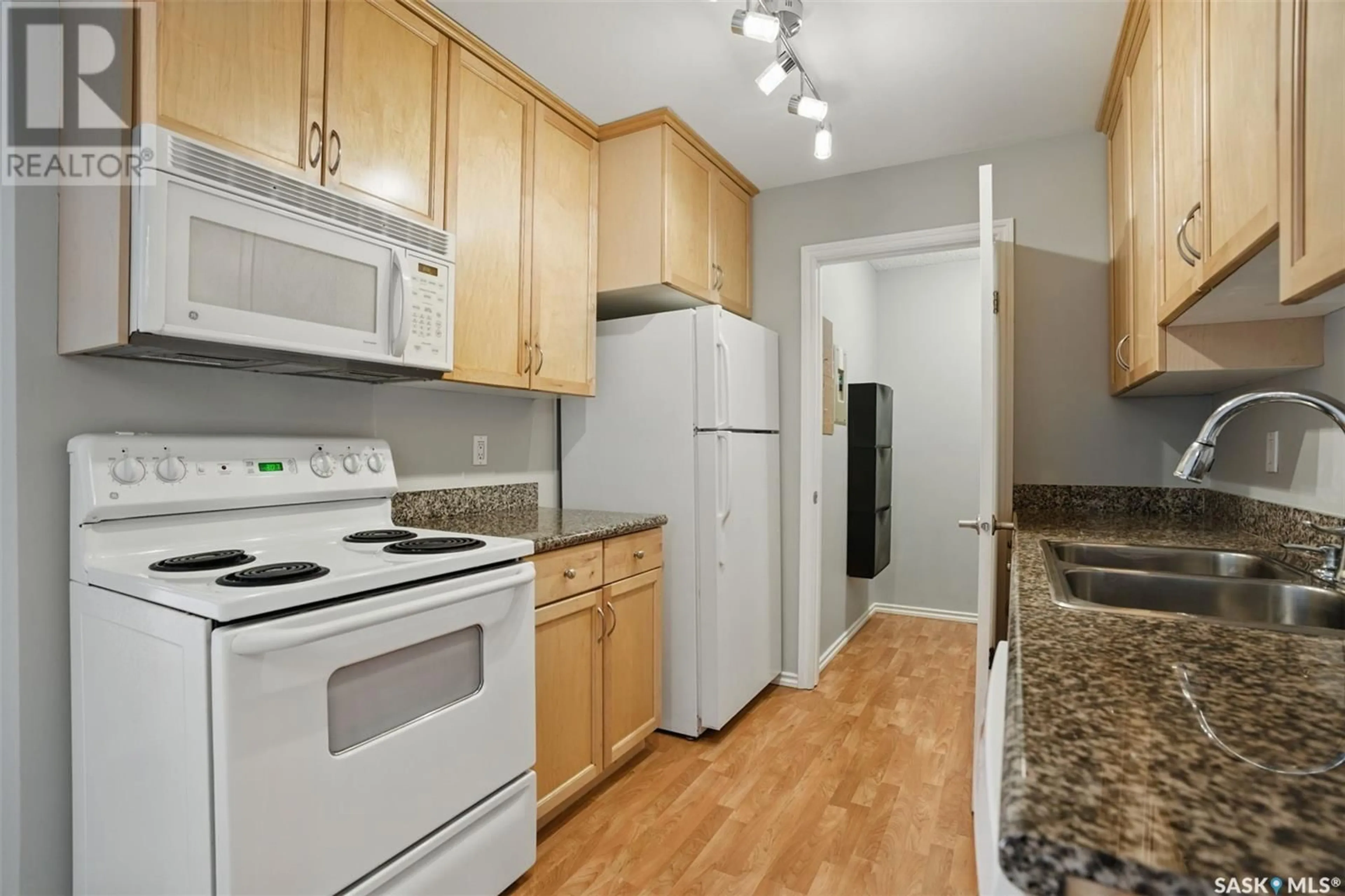 Standard kitchen, wood/laminate floor for 303A2 - 1121 MCKERCHER DRIVE, Saskatoon Saskatchewan S7H5B8