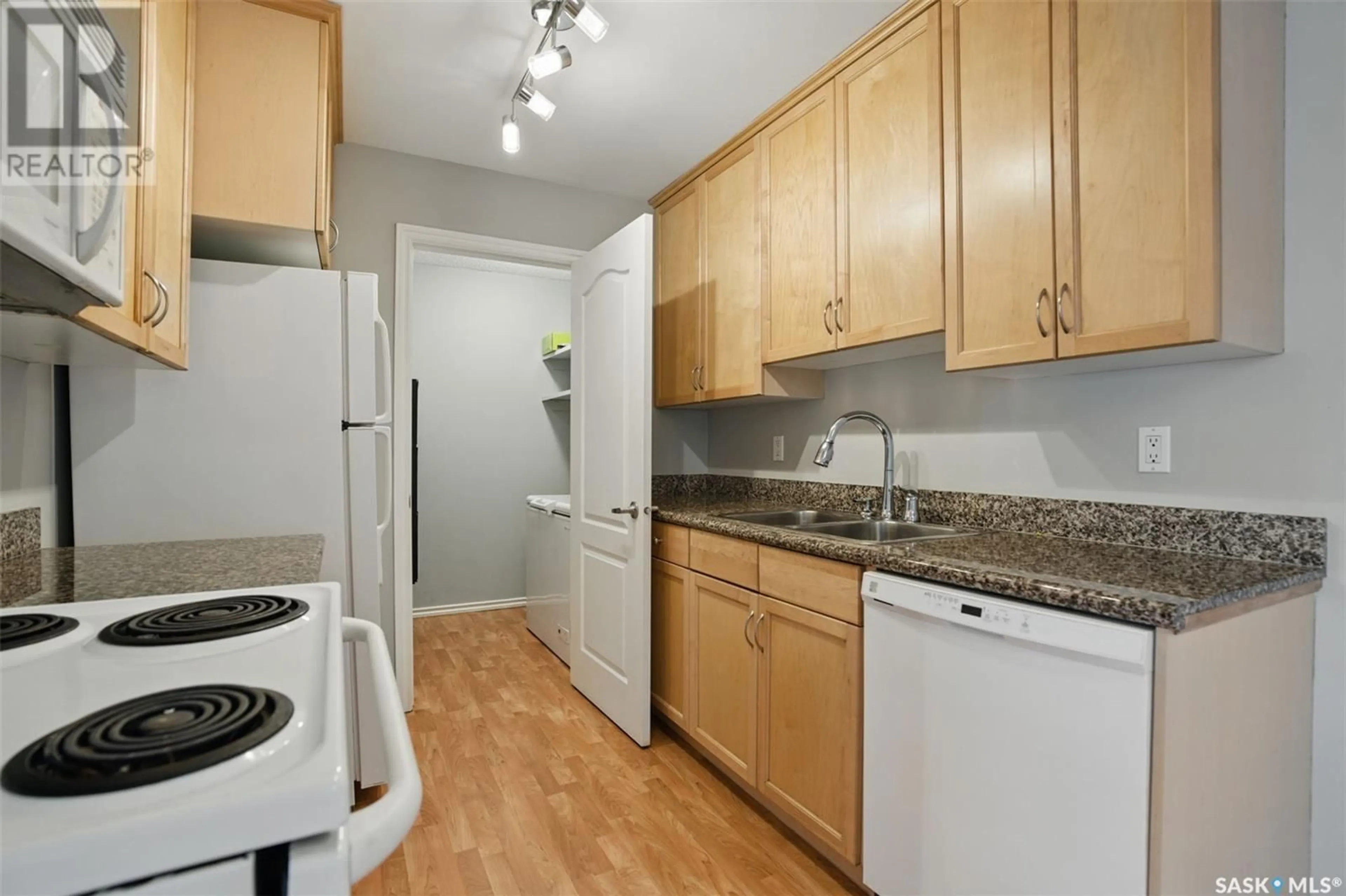 Standard kitchen, wood/laminate floor for 303A2 - 1121 MCKERCHER DRIVE, Saskatoon Saskatchewan S7H5B8